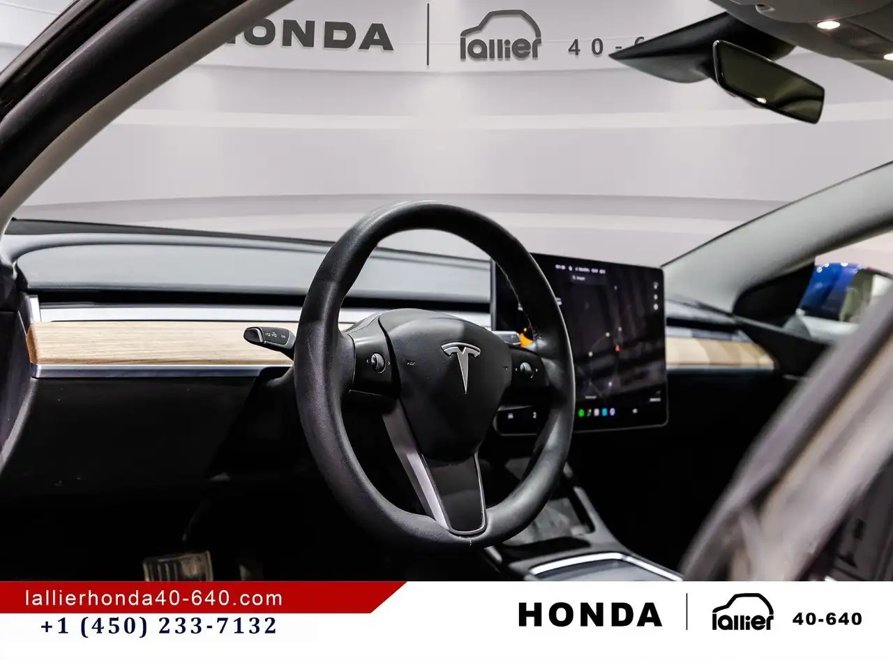 Tesla Model 3 photo Tesla Model 3