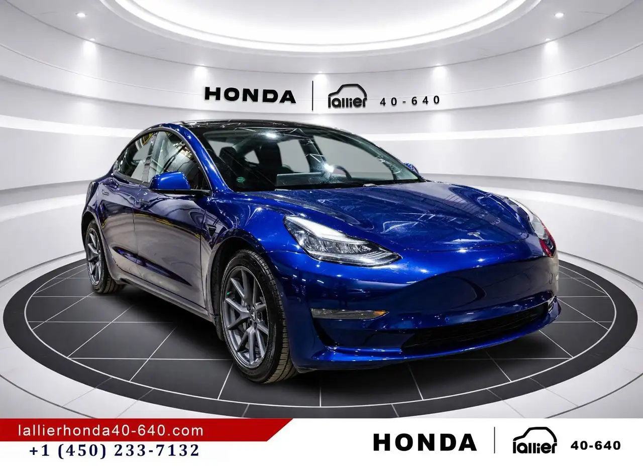 Tesla Model 3 photo Tesla Model 3
