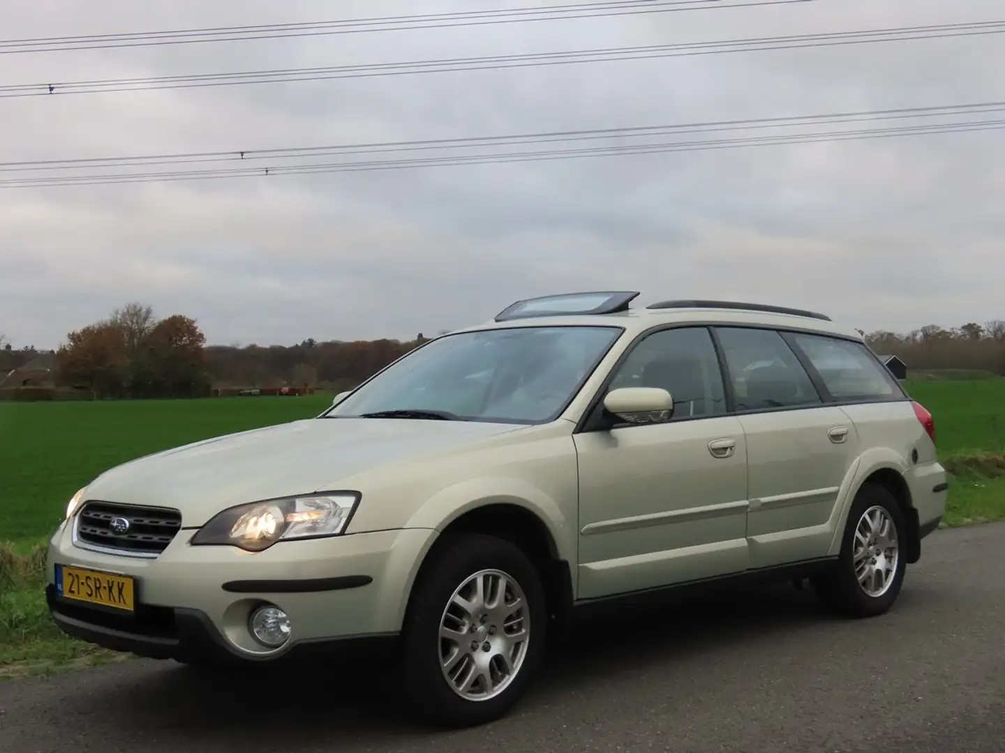 Subaru OUTBACK 2.5i Comfort, Pano, Cruise, ECC, Haak, 22x Beurt Geel - 2