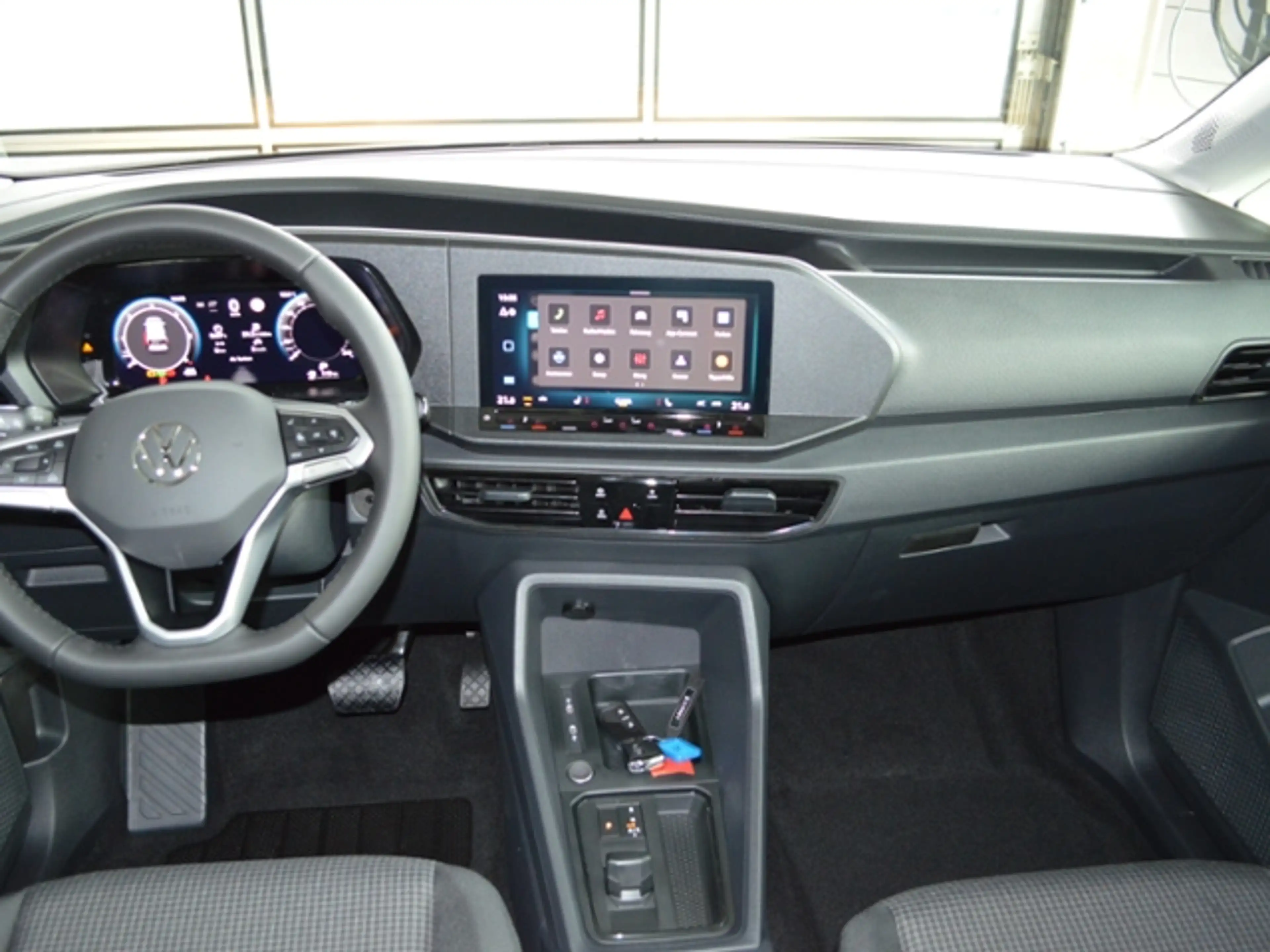 Volkswagen Caddy 2,0 TDI DSG KLIMA APP C. SH — photo 10