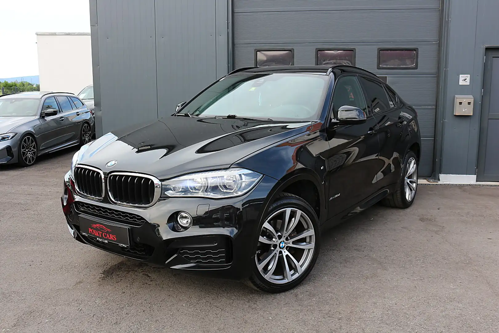 BMW X6 xDrive30d Sport Activity Coupé Österreich-Paket... Schwarz - 1
