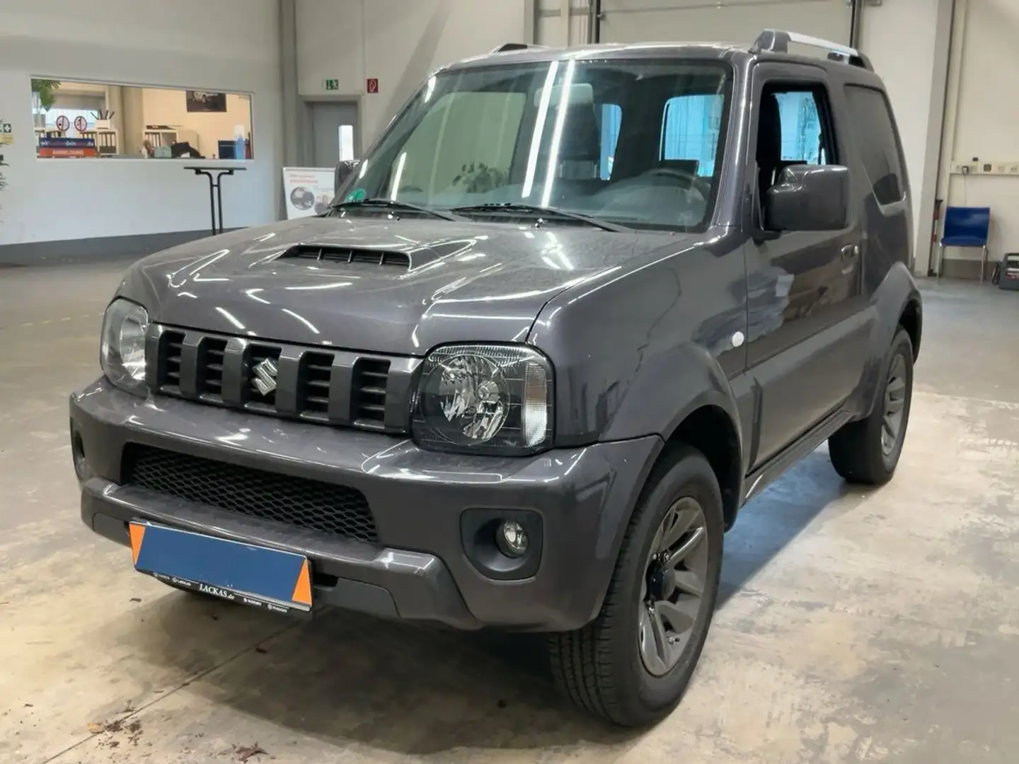 Suzuki Jimny Style Lim. 4.550 Km ! Grau - 1