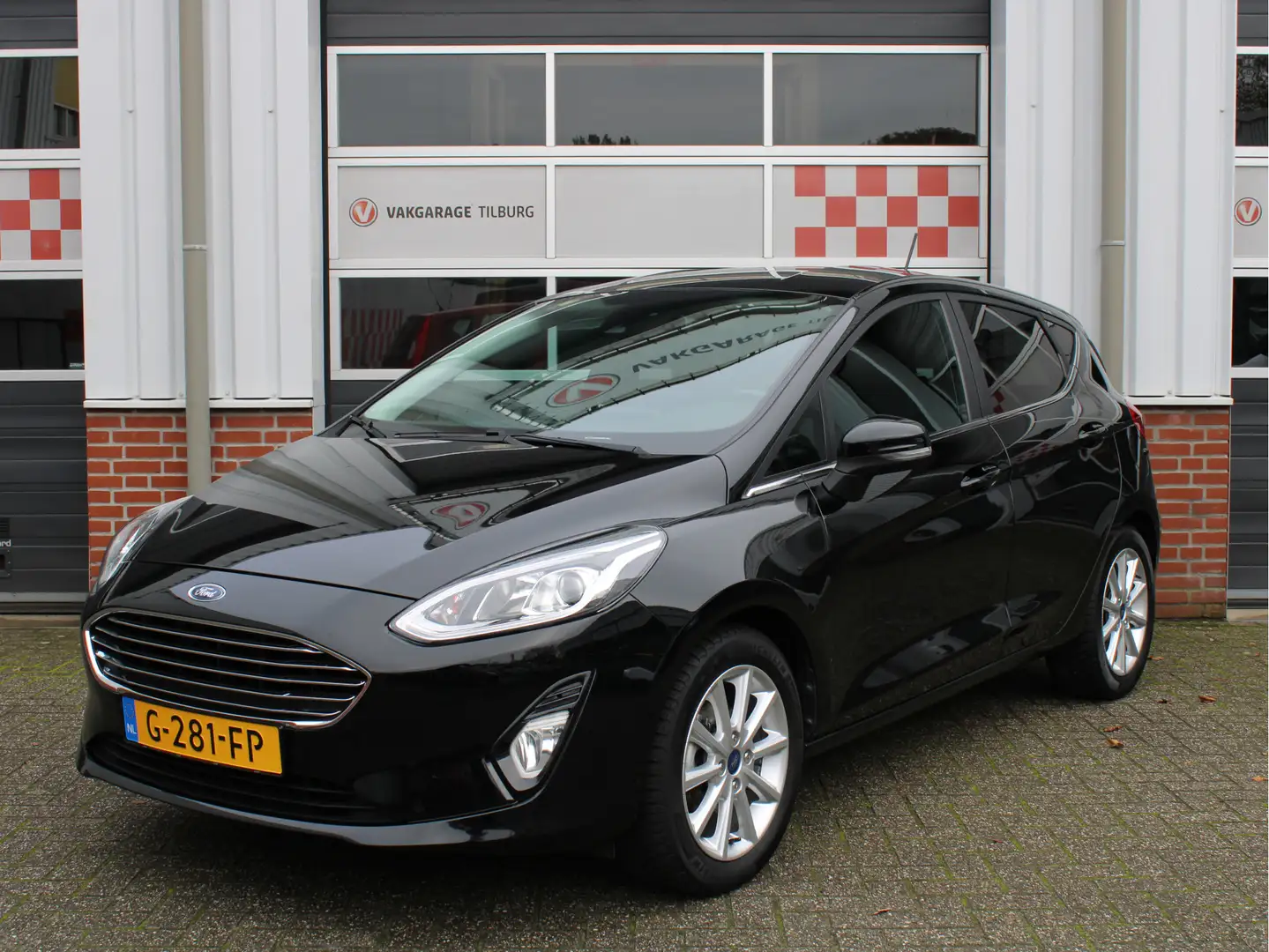 Ford Fiesta 1.0 EcoBoost Titanium 1e Eig/Dealer onderh./Navi/A Zwart - 1