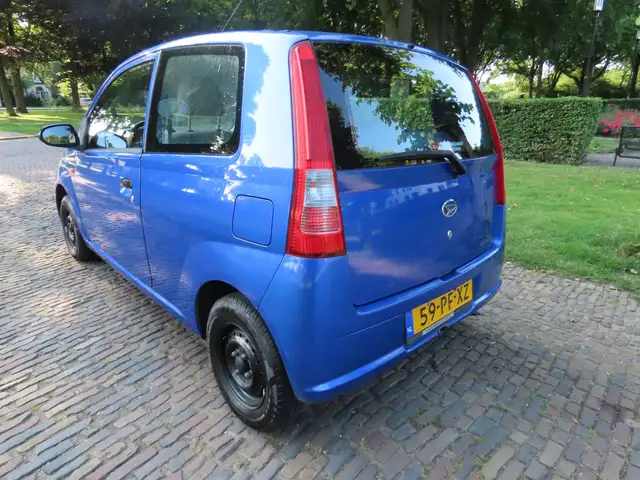 Daihatsu Cuore view 4