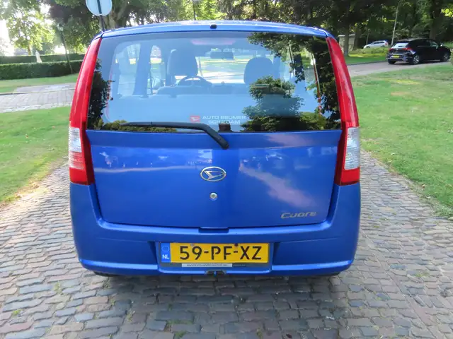 Daihatsu Cuore view 5