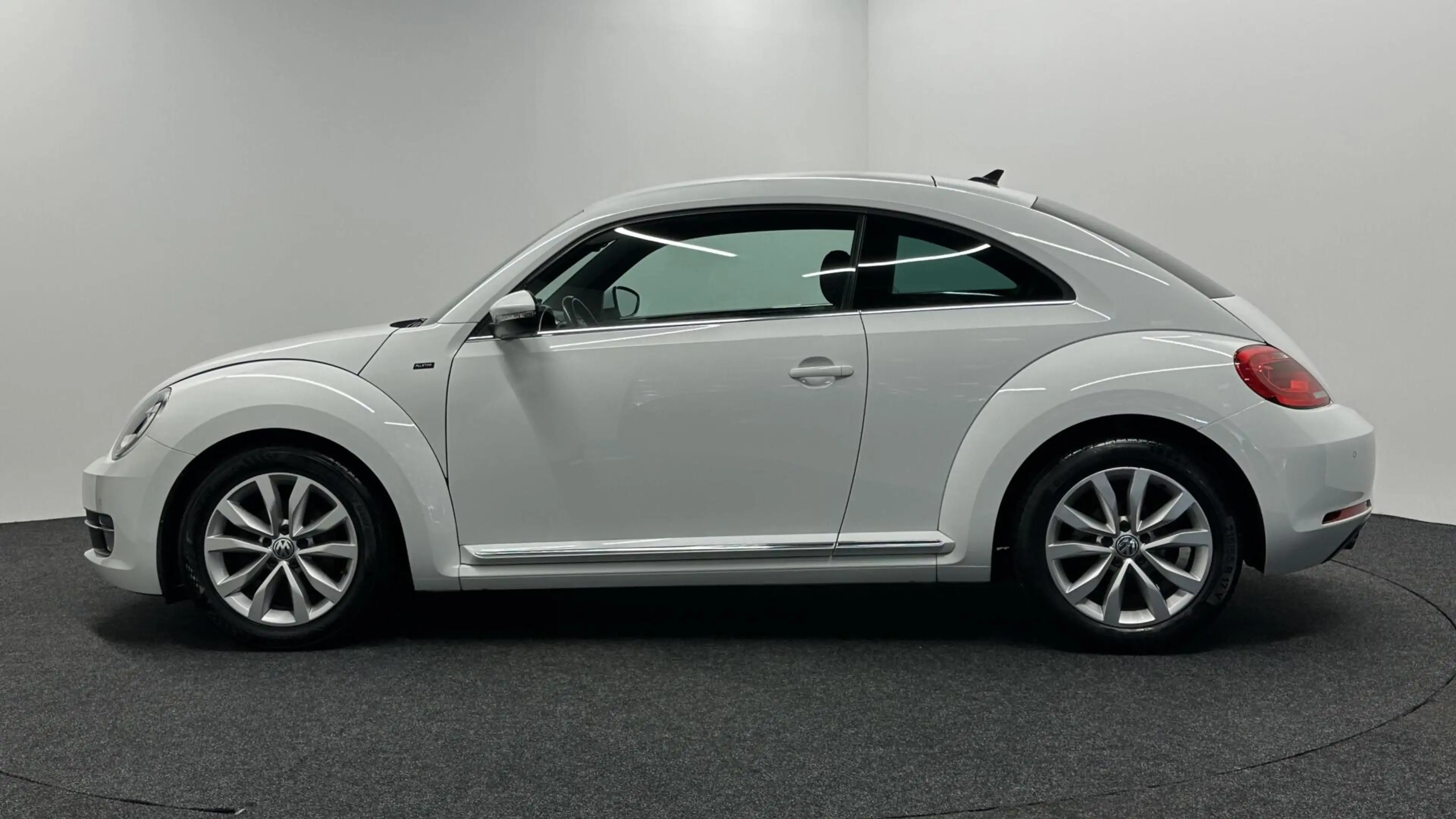 Volkswagen Beetle 1.2 TSI Exclusive Series LEER NAVI CRUISE LM STOEL — photo 8