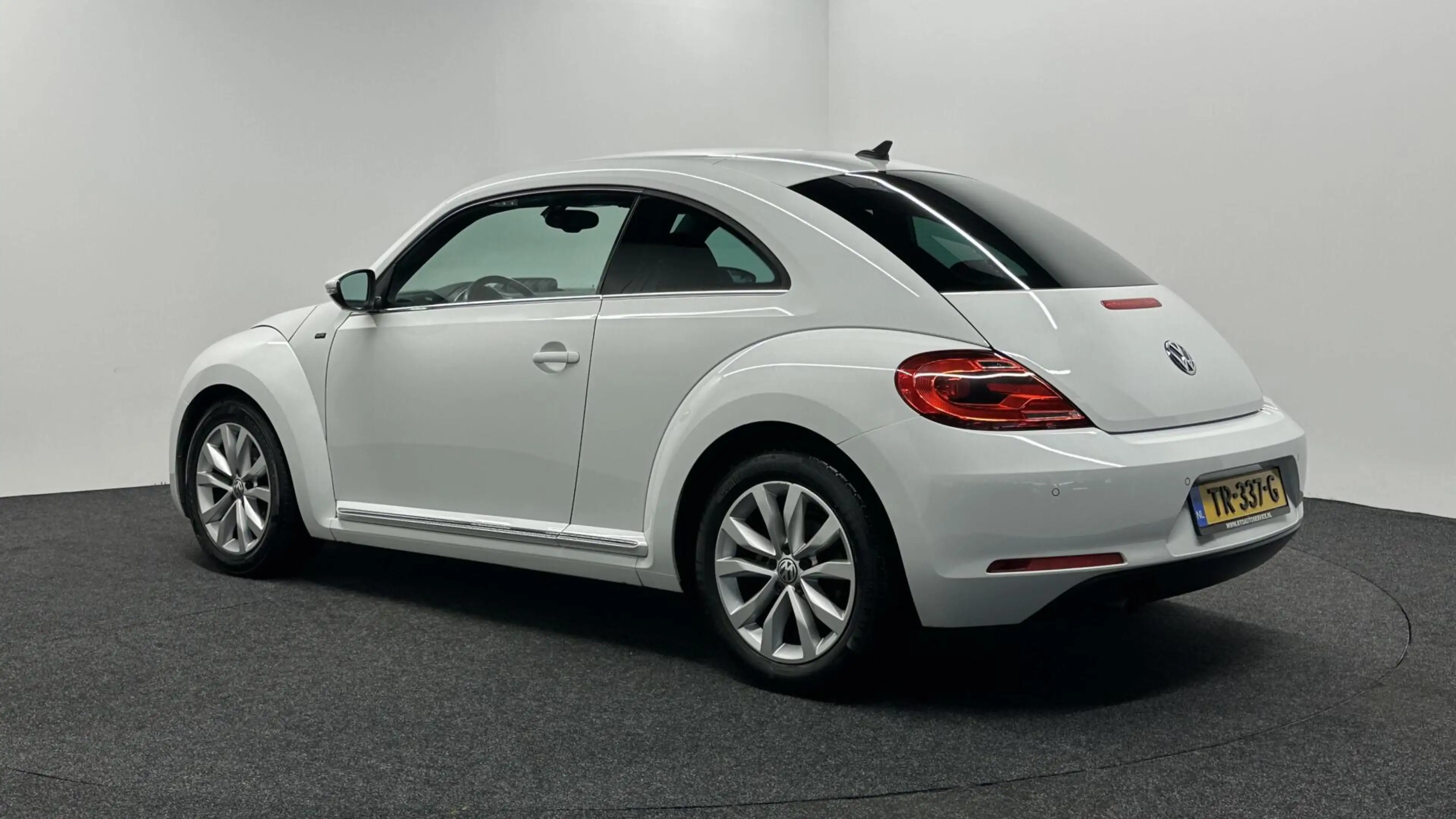 Volkswagen Beetle 1.2 TSI Exclusive Series LEER NAVI CRUISE LM STOEL — photo 4