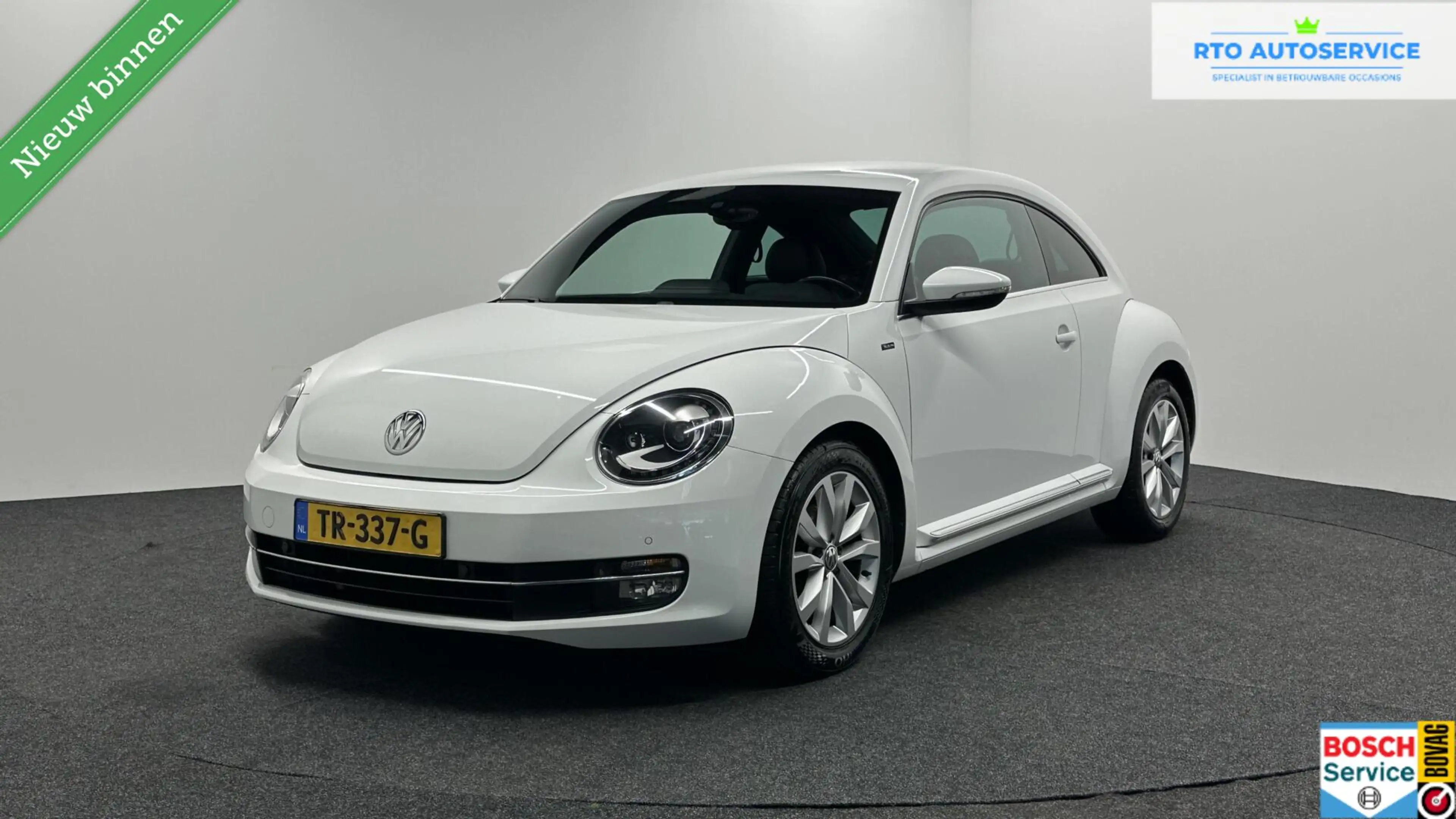 Volkswagen Beetle 1.2 TSI Exclusive Series LEER NAVI CRUISE LM STOEL