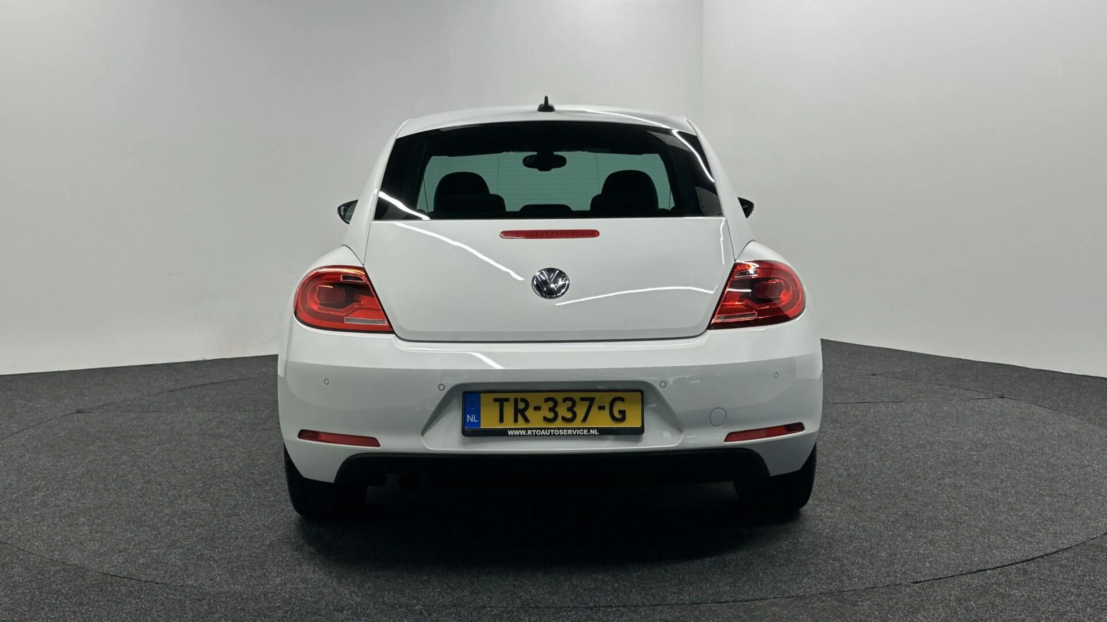 Volkswagen Beetle 1.2 TSI Exclusive Series LEER NAVI CRUISE LM STOEL — photo 7