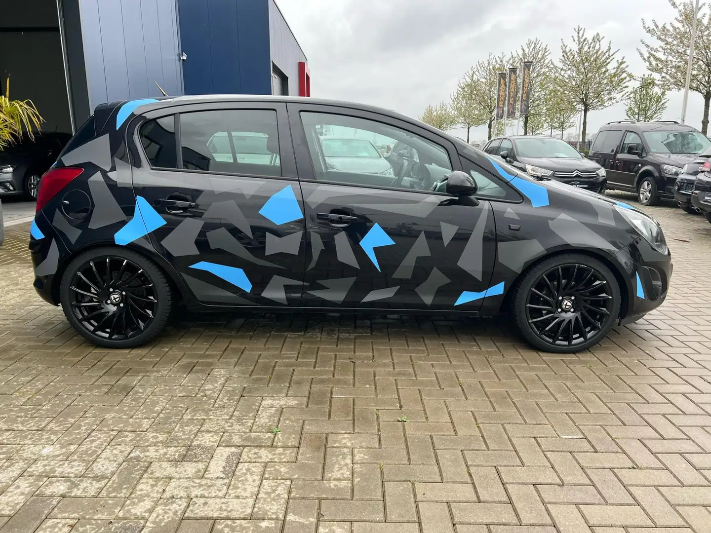 Opel Corsa 1.2-16V Cosmo / UNIEK! / AIRCO / H&R VERLAGING / E Zwart - 2