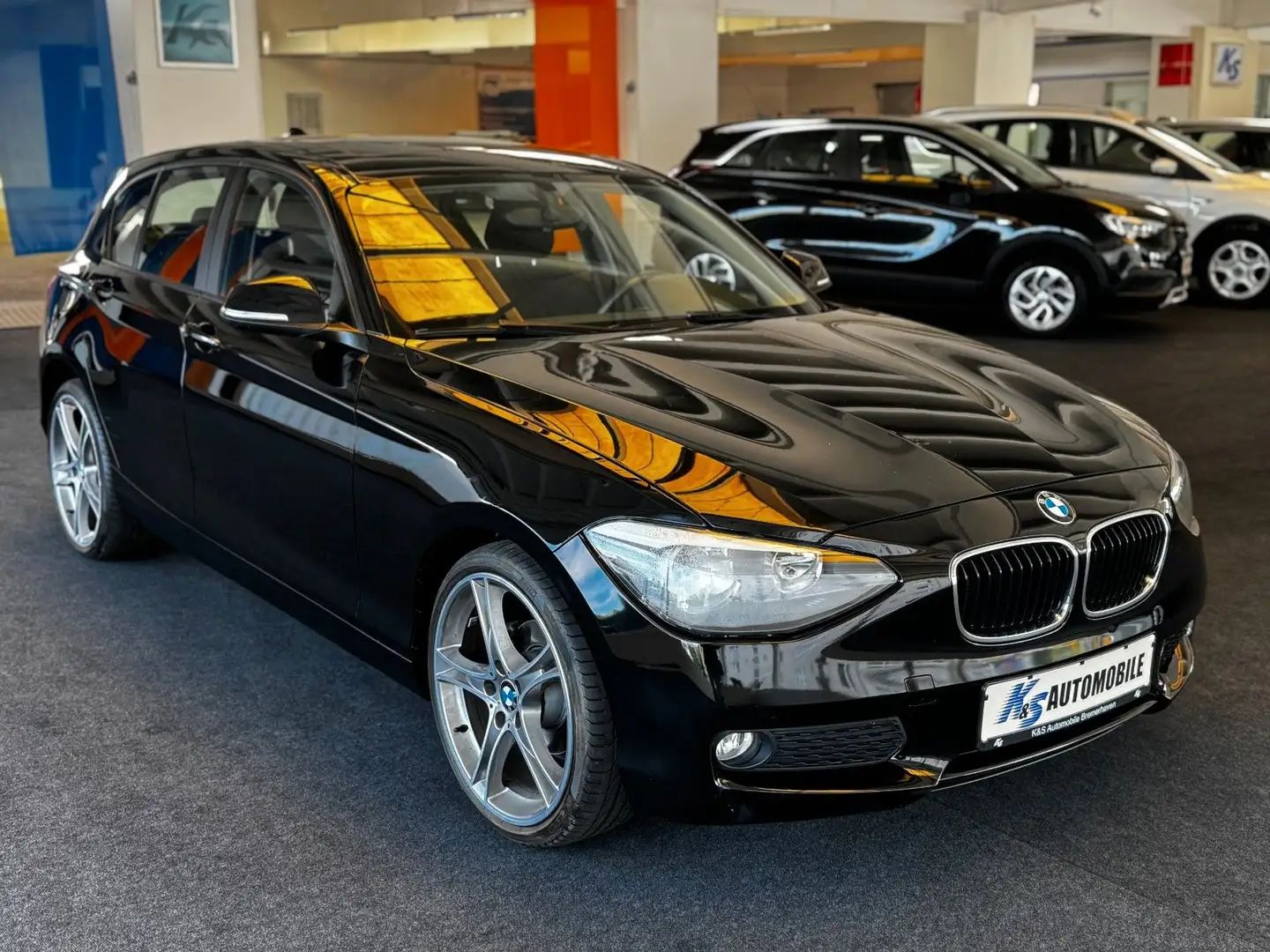 BMW 114 i Lim. 5-trg.*SD*ALU*KLIMA*PDC* Noir - 1