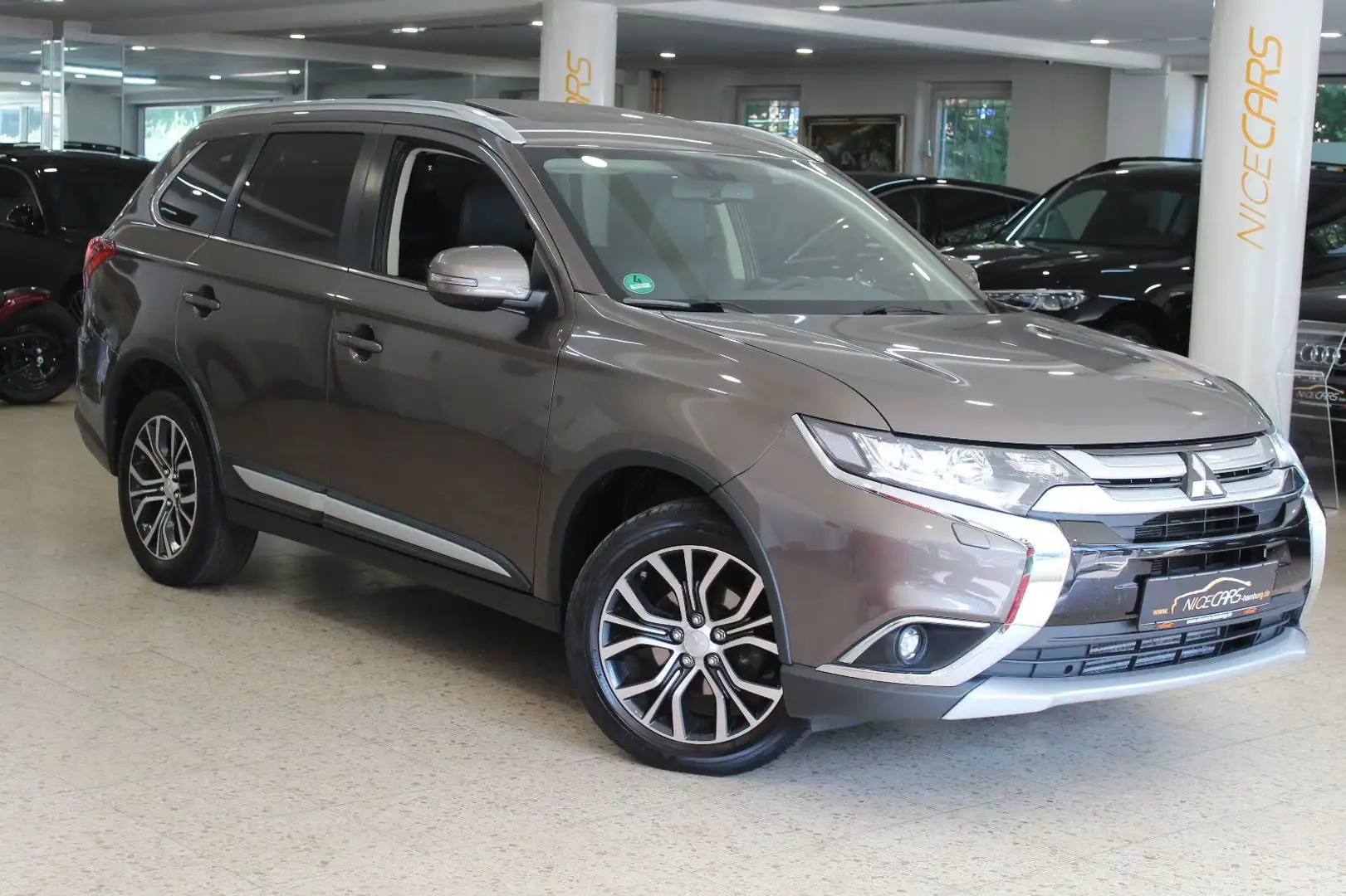 Mitsubishi Outlander Outlande 2,2"Top"4WD"7 Sitze"SDach"Leder"Navi"2H Braun - 1