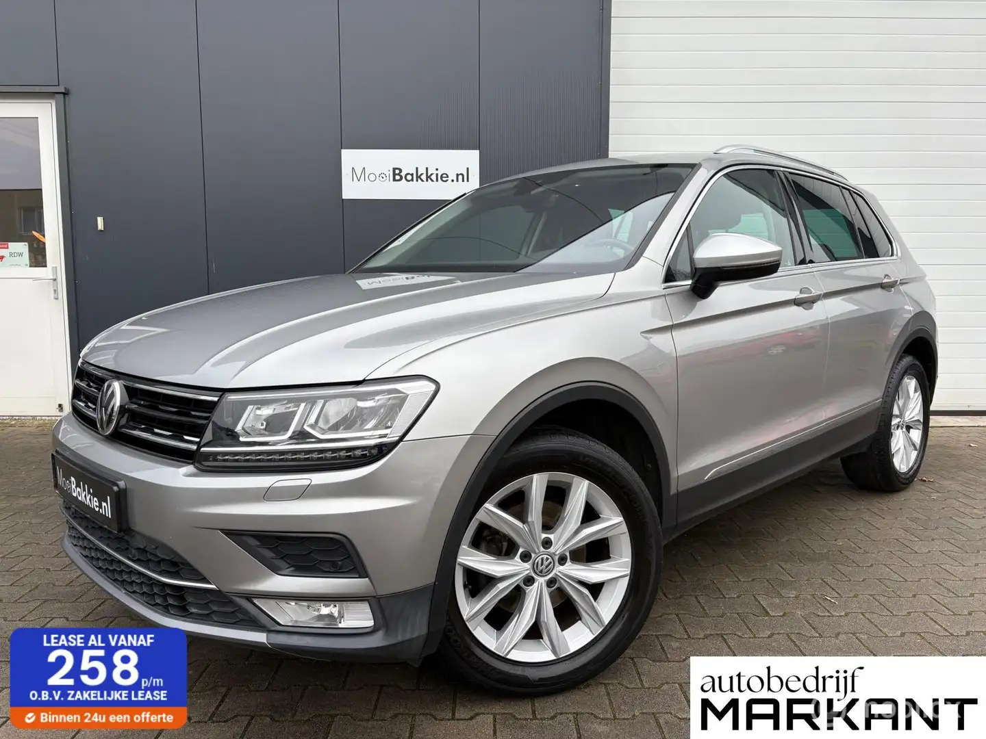 Volkswagen Tiguan 1.4 TSI 150pk 4-Motion Trekhaak / Navi Gris - 1