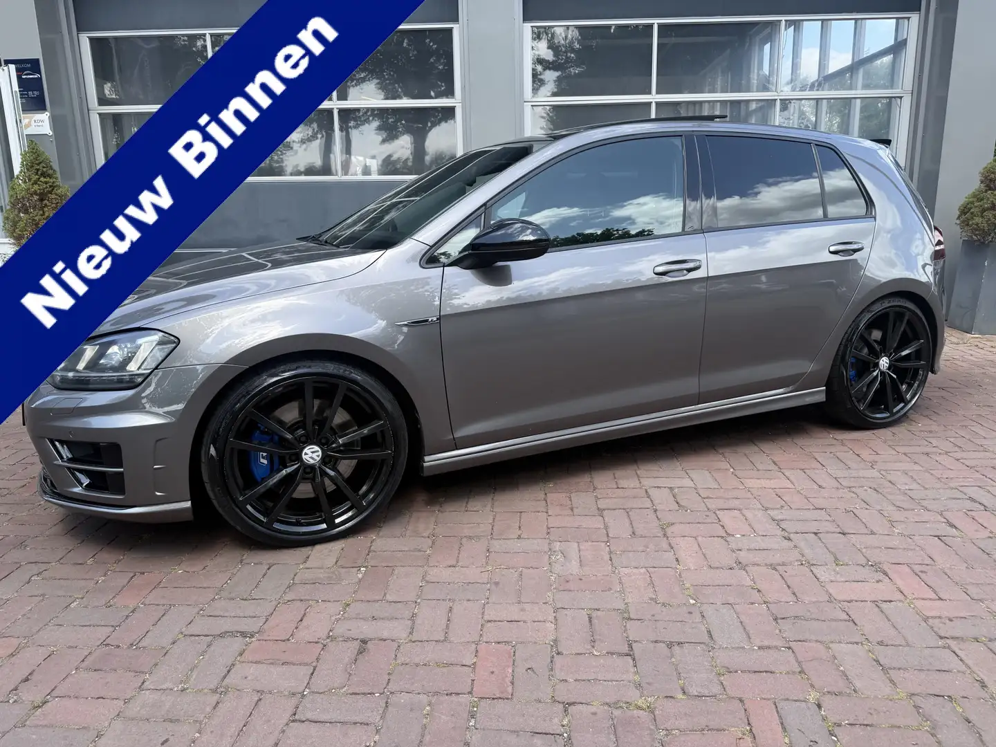 Volkswagen Golf Variant 2.0 TSI R R 221KW 5D 4MOTION DSG 2015 Grijs 301pk Grijs - 1