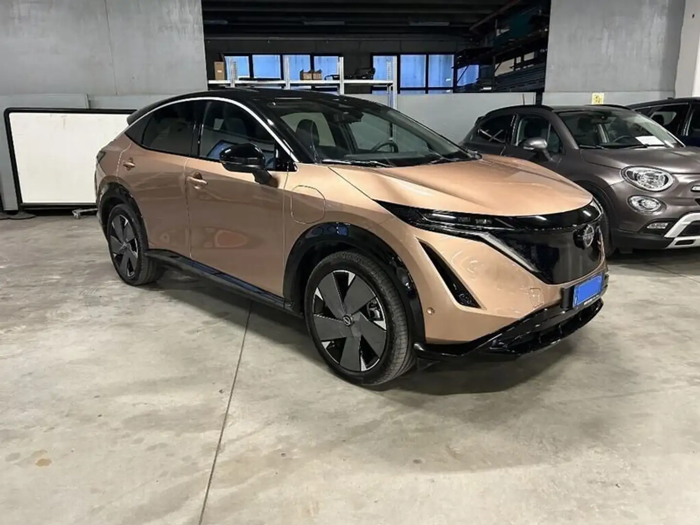 Nissan Ariya 87 kWh Evolve Bronz - 1
