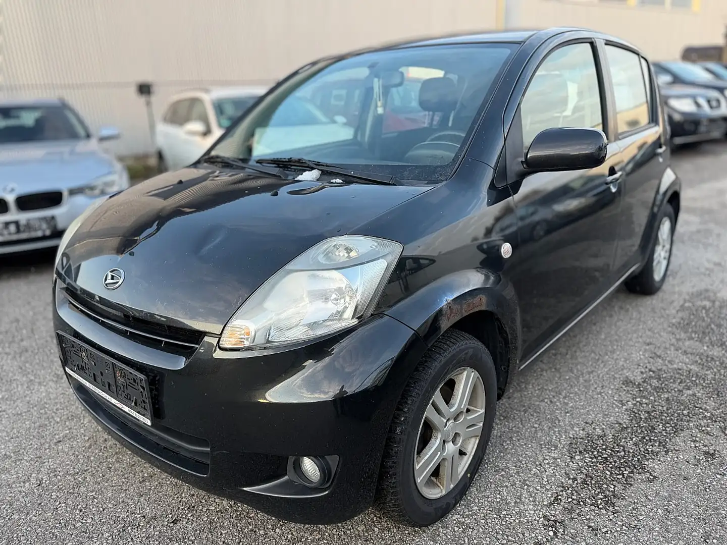 Daihatsu Sirion 1,0 Top Schwarz - 1