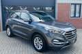 Hyundai TUCSON 1.6 GDi LEER/NAVI/CAMERA Dealer onderhouden Grijs - thumbnail 1
