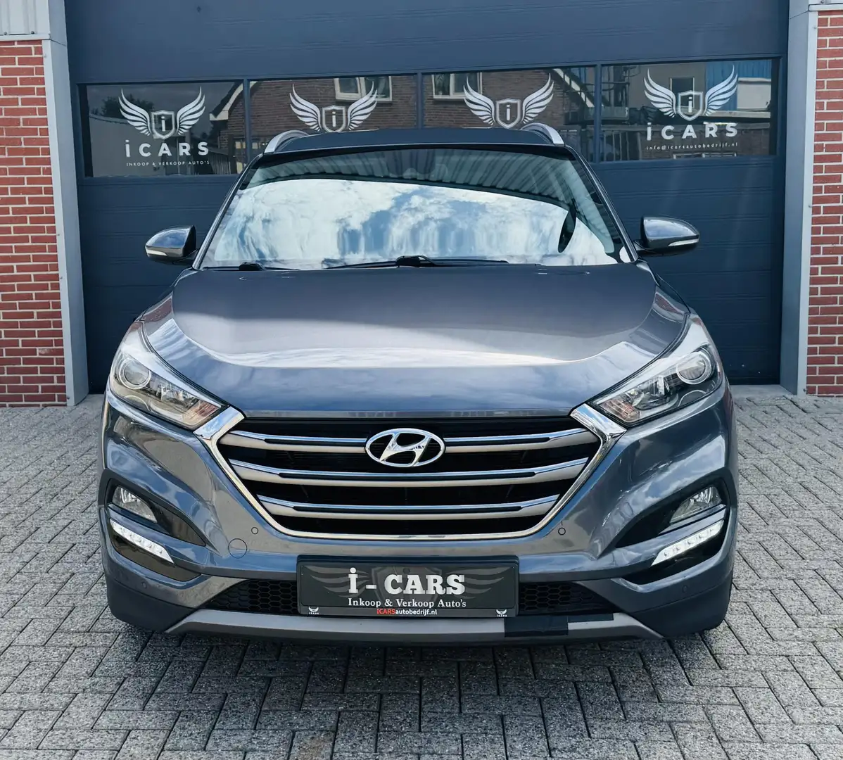 Hyundai TUCSON 1.6 GDi LEER/NAVI/CAMERA Dealer onderhouden Grijs - 2