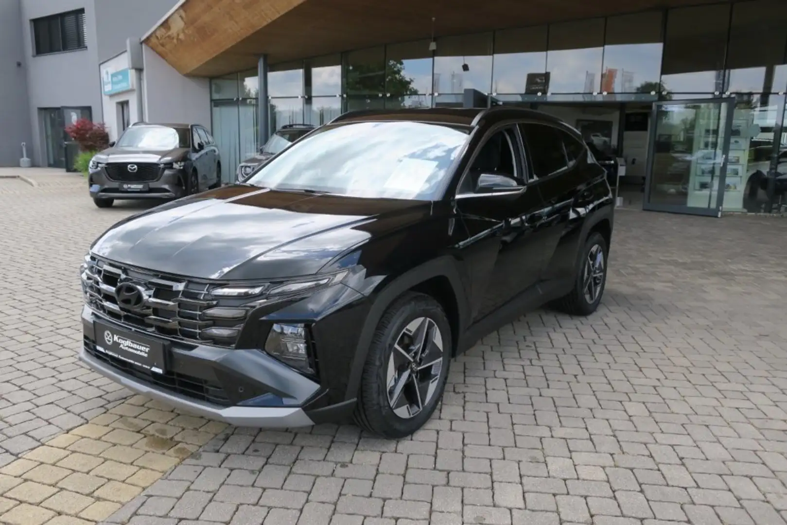 Hyundai TUCSON NX4 GO 1,6 T-GDi 2WD DCT t6bg2 Schwarz - 1