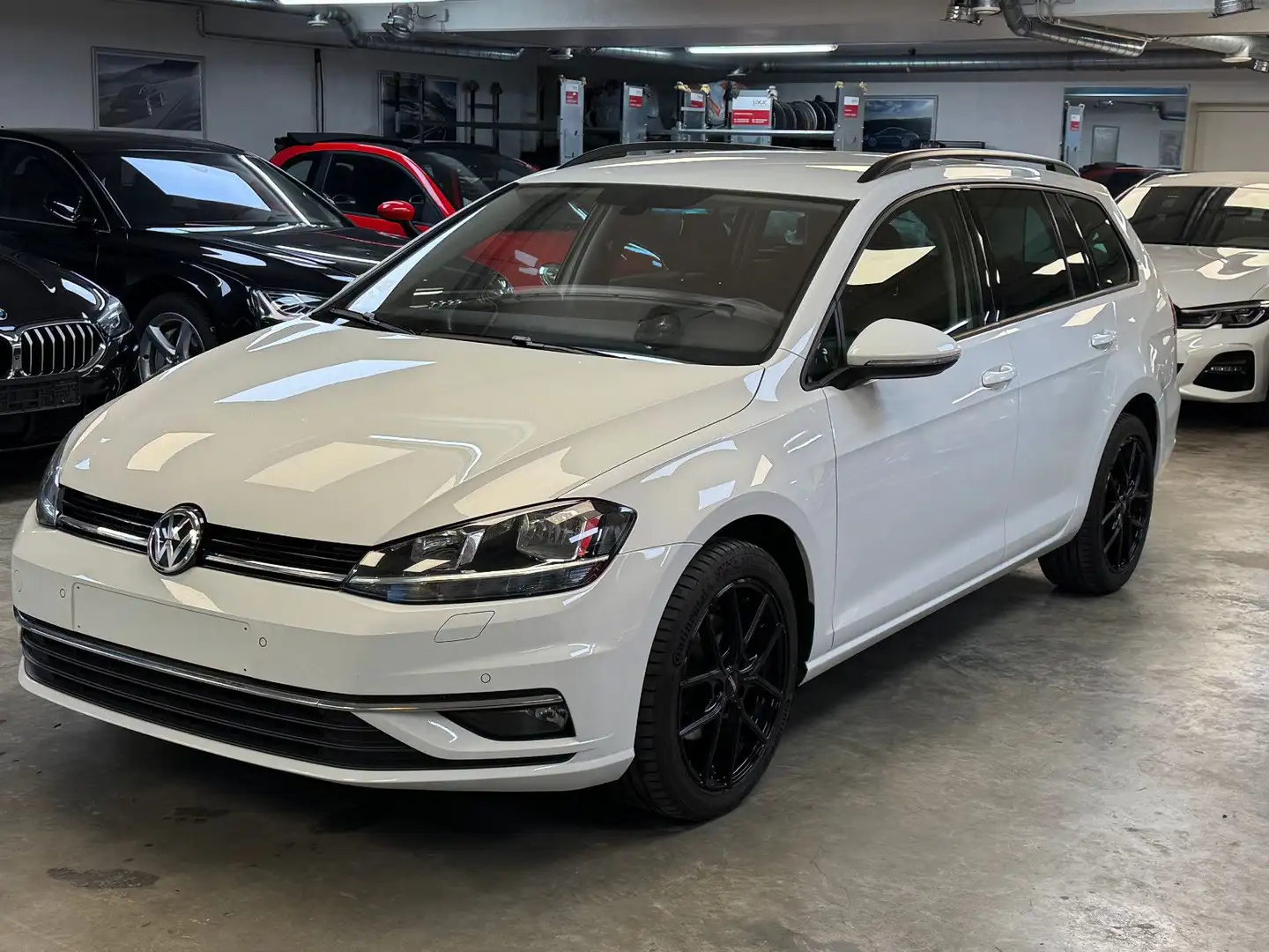 Volkswagen Golf VII Variant Comfortline Start-St.,Navi,AHK Weiß - 1