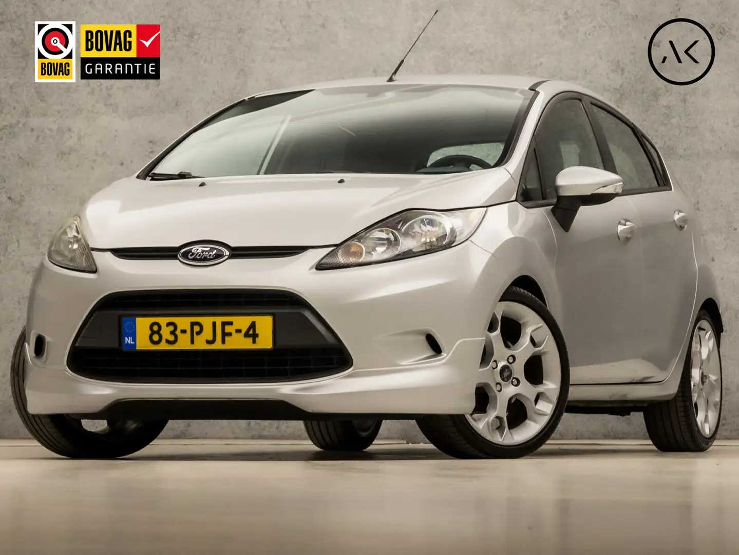 Ford Fiesta 1.25 Sport (5 DEURS, AIRCO, MULTIFUNCTIONEEL STUUR Grijs - 1