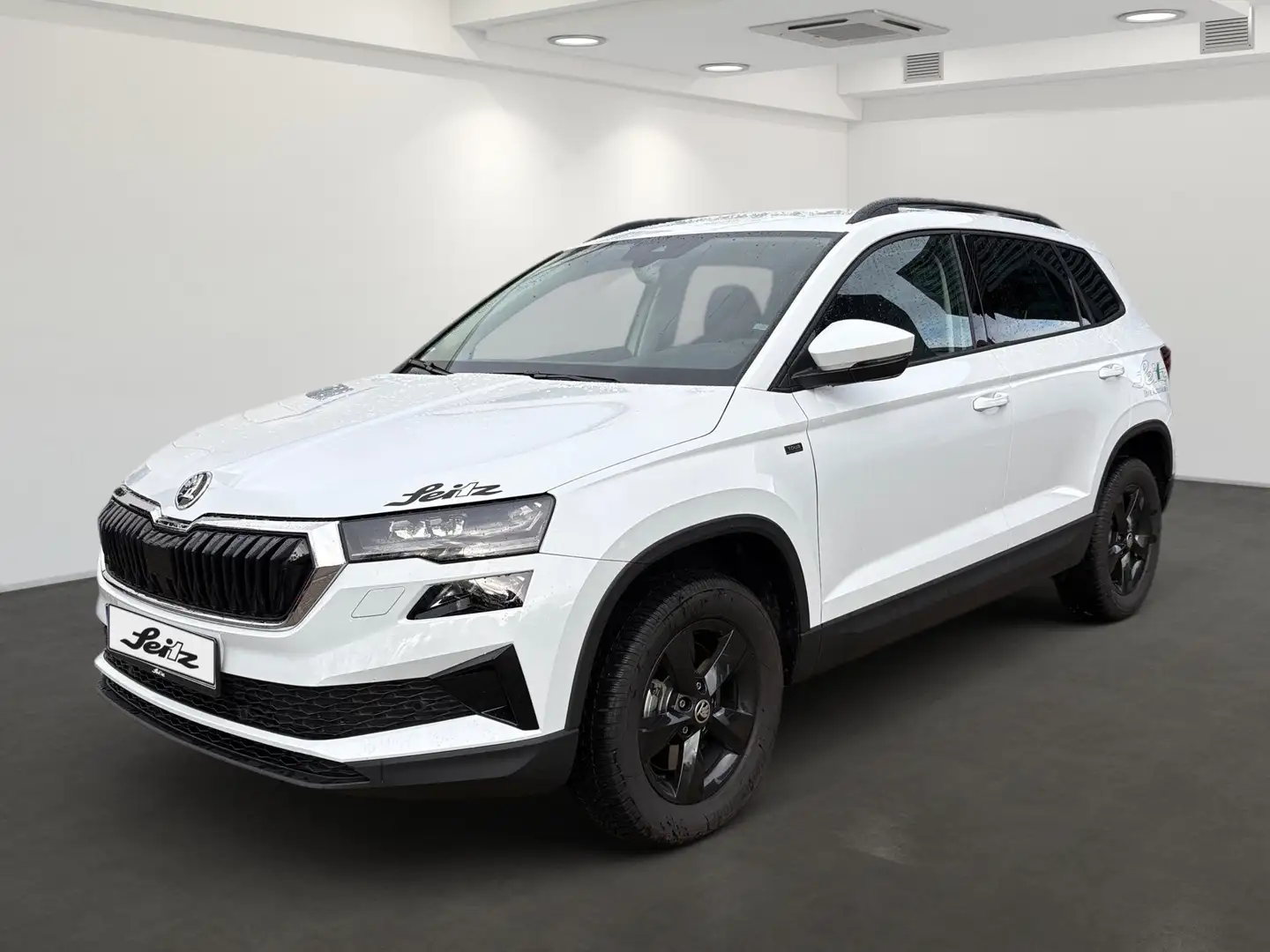 Skoda Karoq 2.0 TDI Tour *AHK*NAVI*KAMERA*SITZH* Weiß - 2
