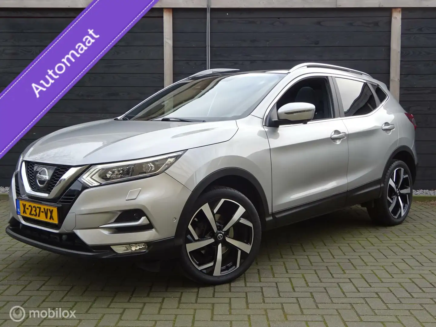 Nissan Qashqai 1.2 Tekna + Automaat / speciaal leder / 19" / Bose Gris - 1