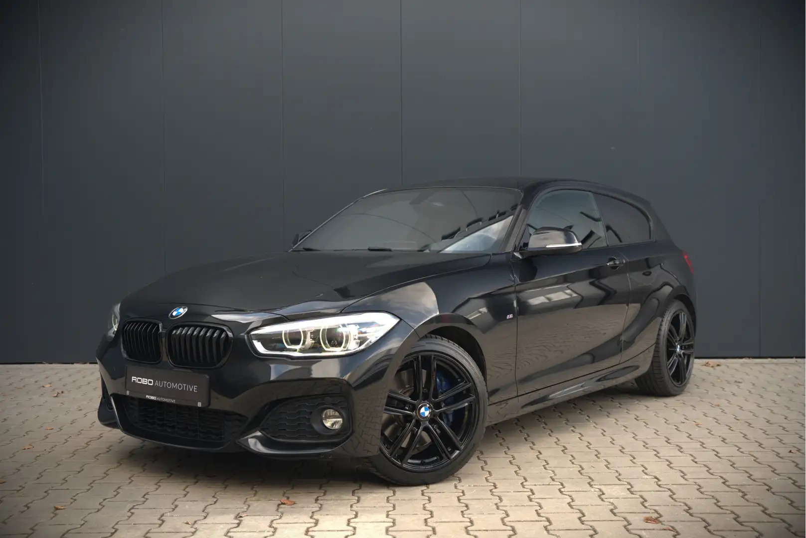 BMW 118 1-serie 118i High Executive M Sport | Stoelverwarm Schwarz - 1