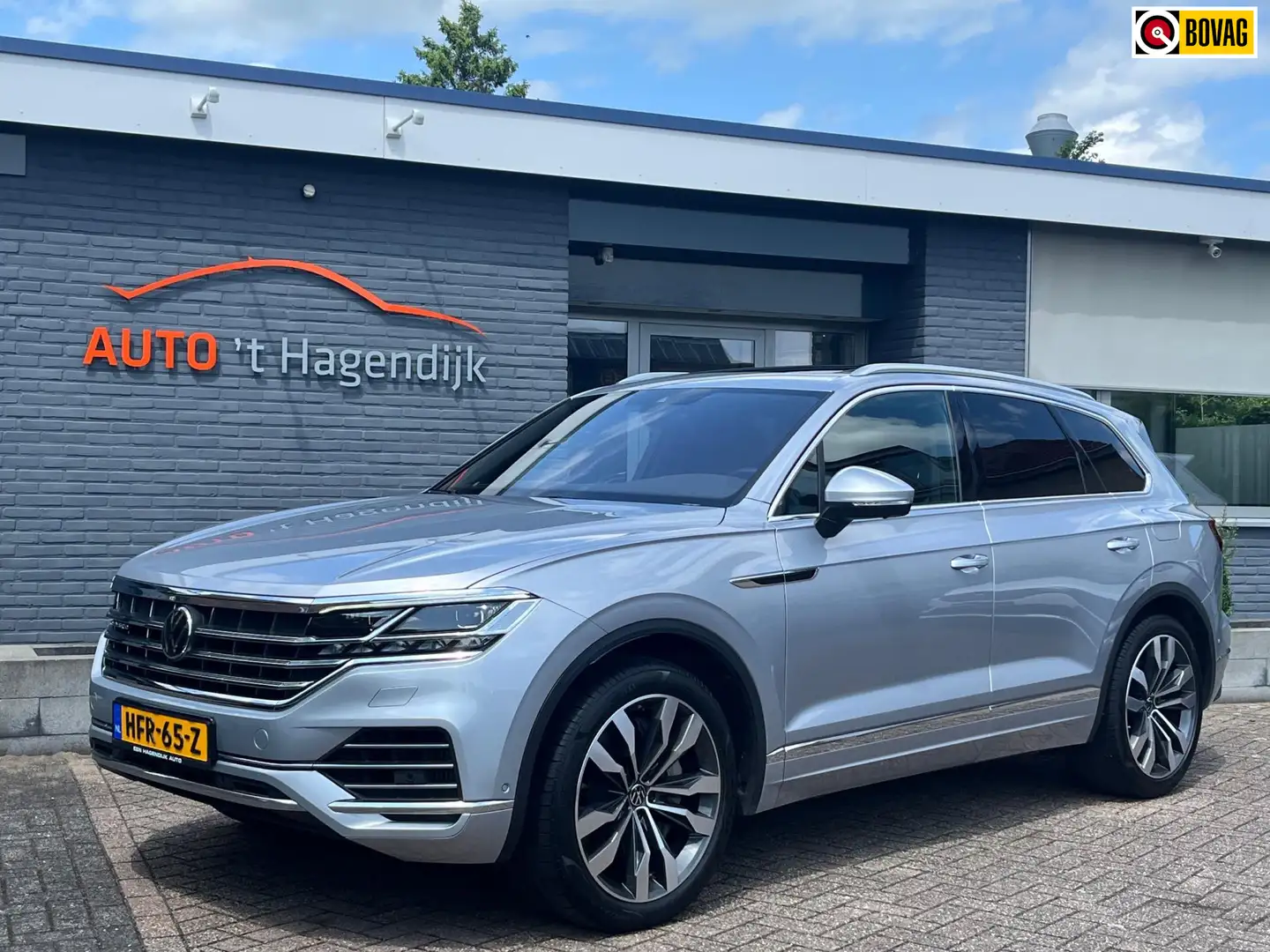 Volkswagen Touareg 3.0 TSi eHybrid 4MOTION pano trekh 1EIG nieuwstaat Grijs - 1