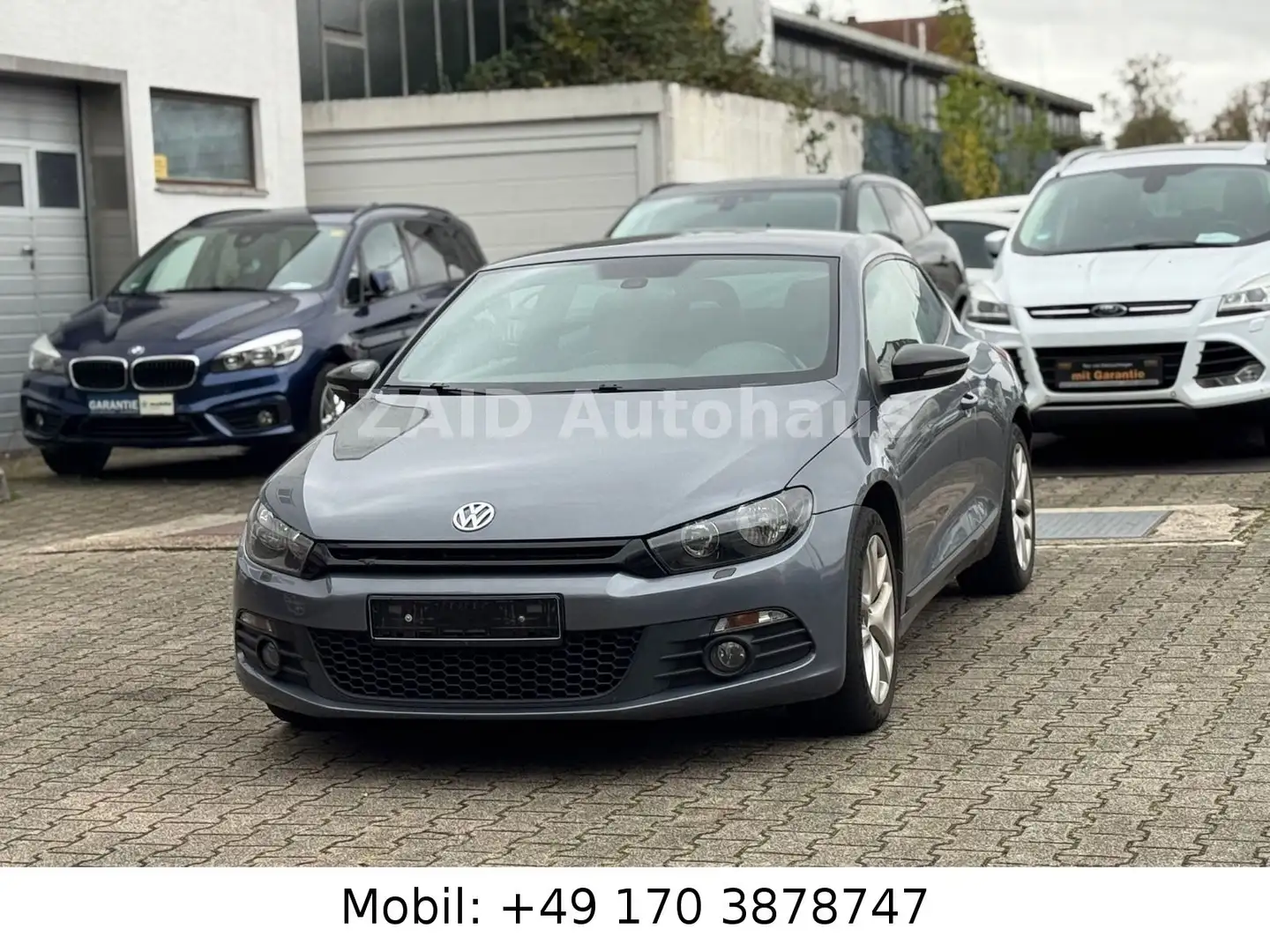 Volkswagen Scirocco 1.4 TSI 118 kW*PDC*NAVI*2HAND Grau - 1