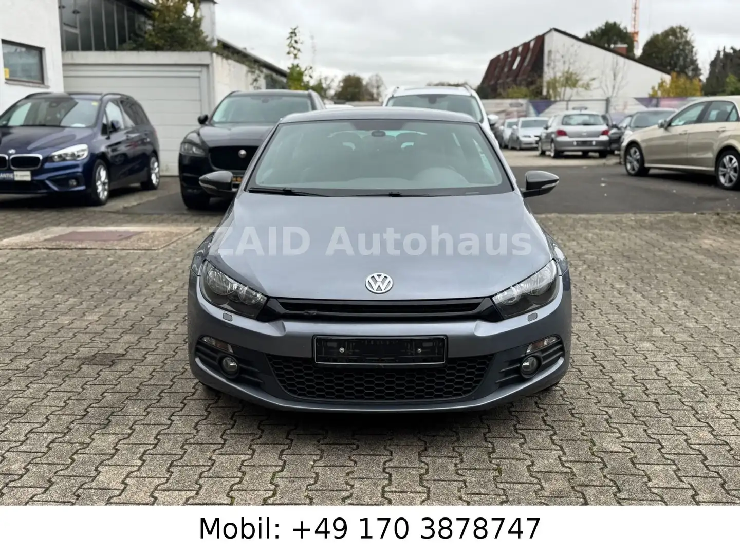 Volkswagen Scirocco 1.4 TSI 118 kW*PDC*NAVI*2HAND Grau - 2