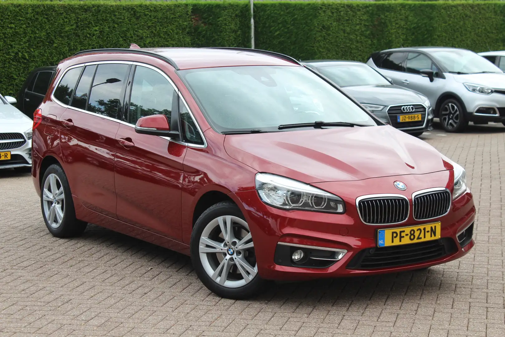 BMW 218 2-serie Gran Tourer 218i 7p. Executive / Trekhaak Rood - 1