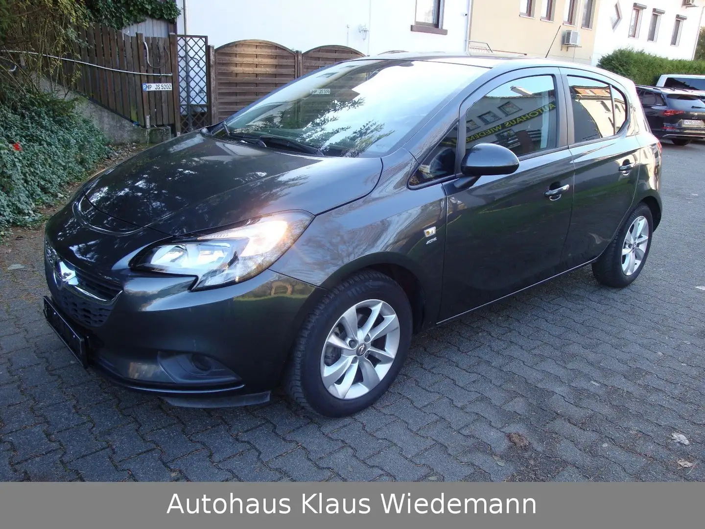 Opel Corsa E 1.4 Active - 2.Hd./orig. 32 TKM Gris - 1