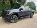 GMC Sierra 1500 AT4 6.2 V8 €73.900 ,- excl btw Gris - thumbnail 2