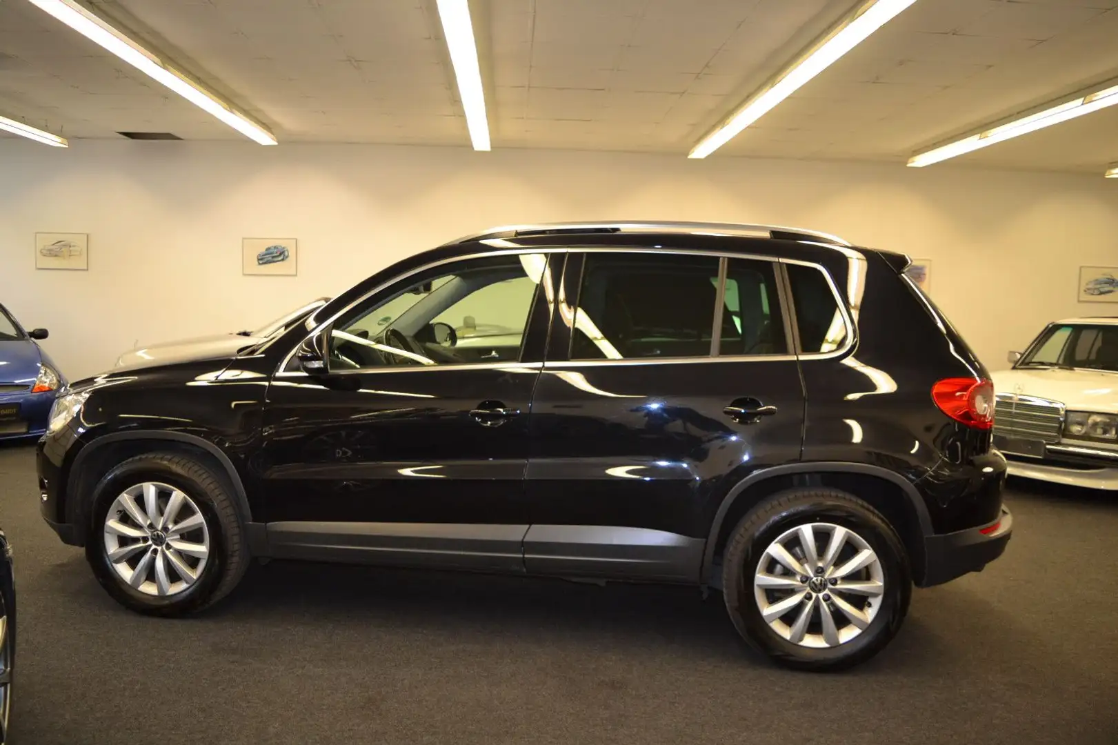 Volkswagen Tiguan Sport & Style BMT Чорний - 1
