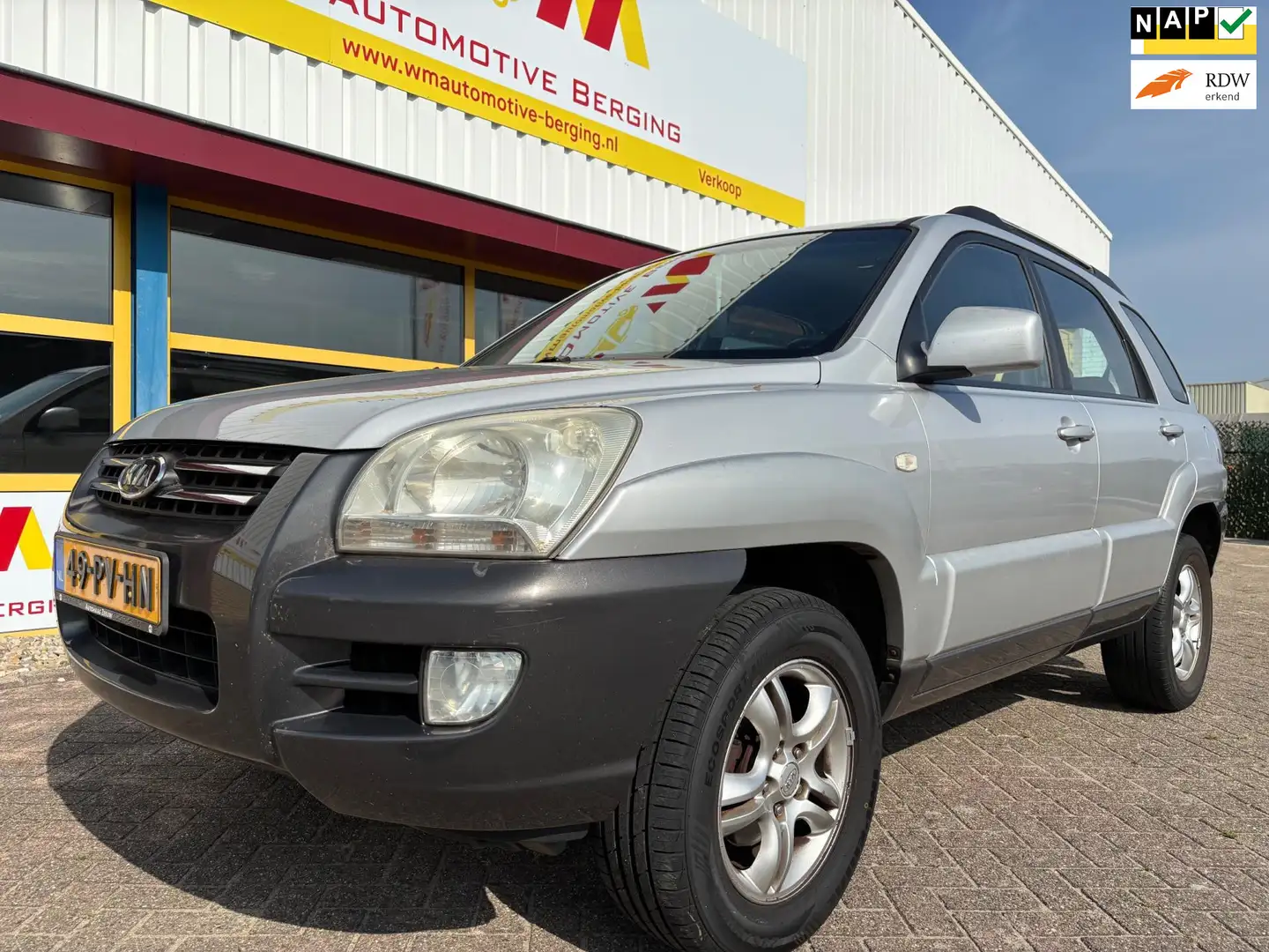 Kia Sportage 2.0 CVVT Comfort AIRCO Grey - 1