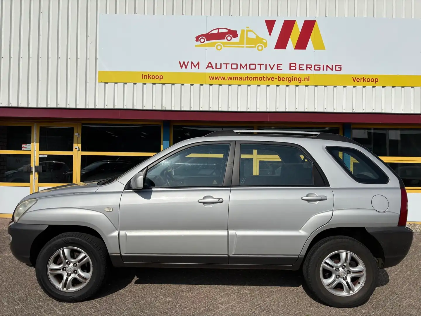 Kia Sportage 2.0 CVVT Comfort AIRCO Grey - 2