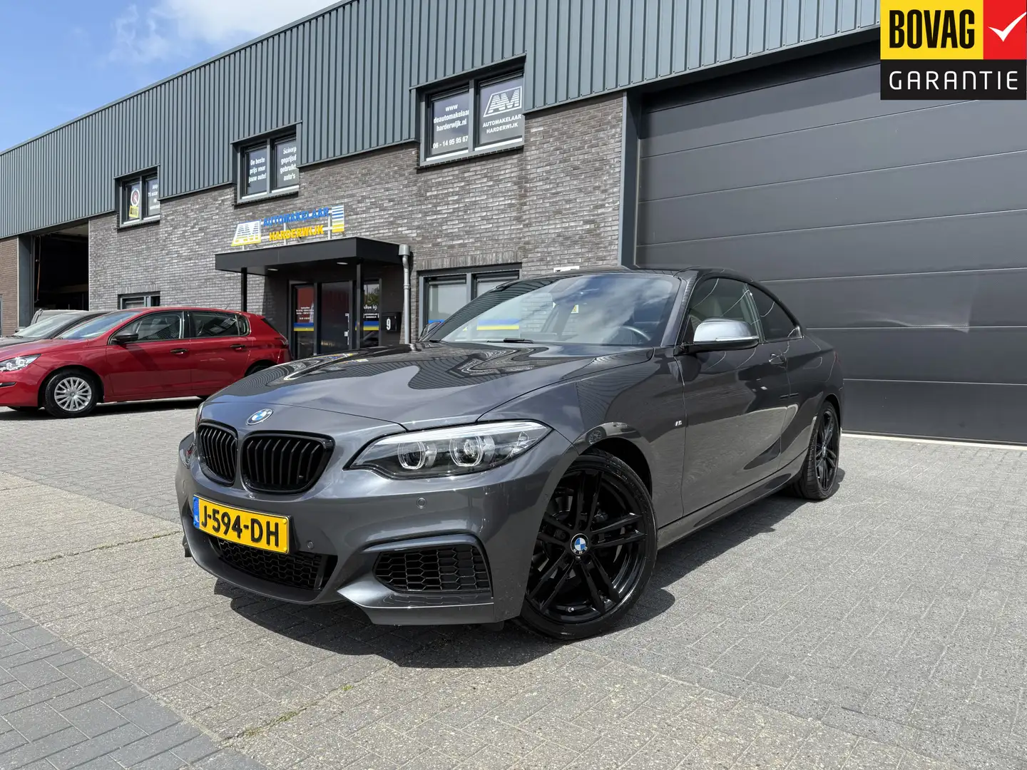 BMW 218 2-serie Coupé 218i High Executive Edition | 1E EIG Grijs - 1