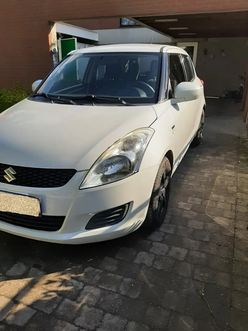 Suzuki Swift 1.3 DDiS Comfort - 1