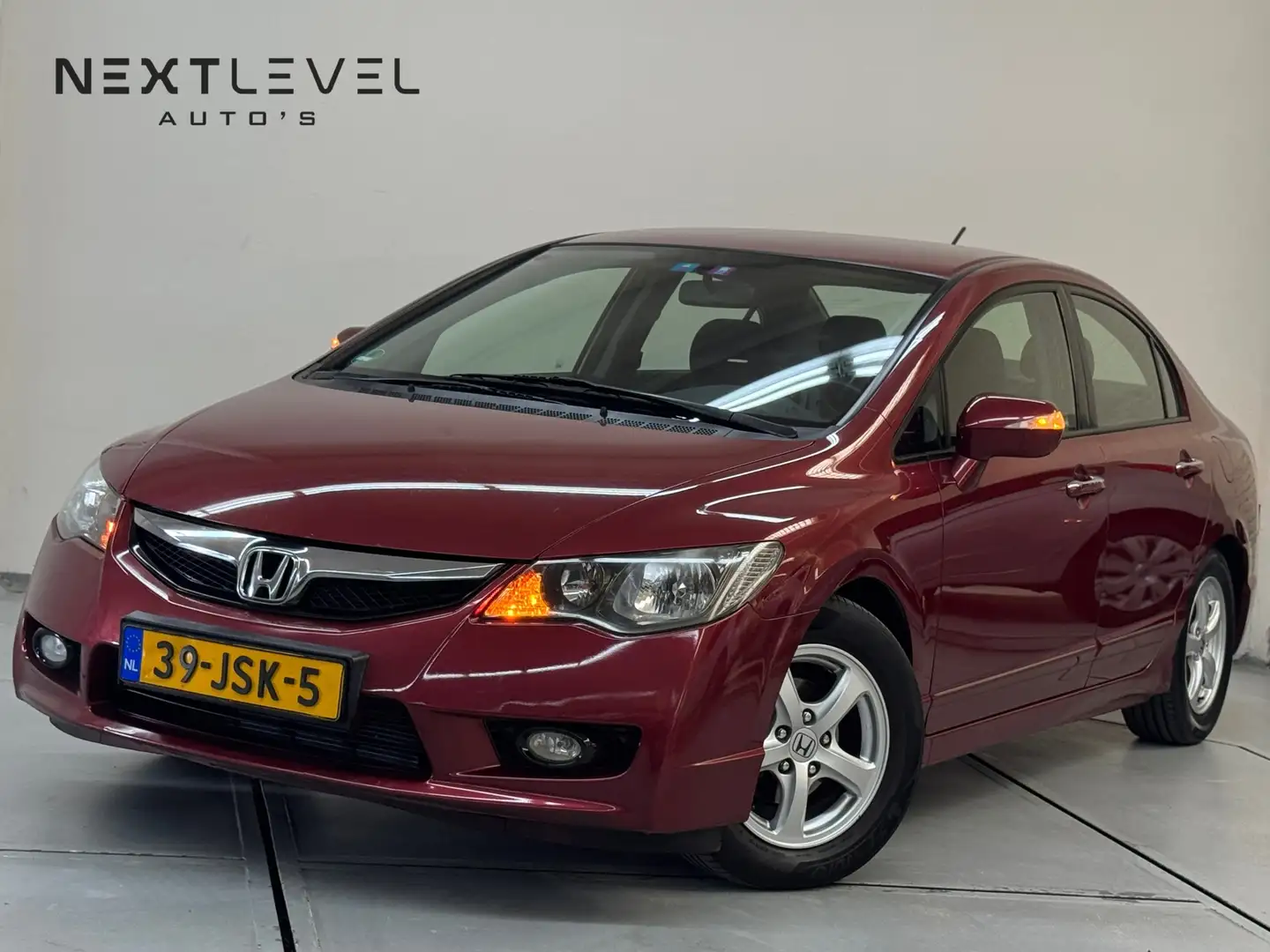 Honda Civic 1.3 Hybrid Elegance Automaat Hybrid Rood - 1
