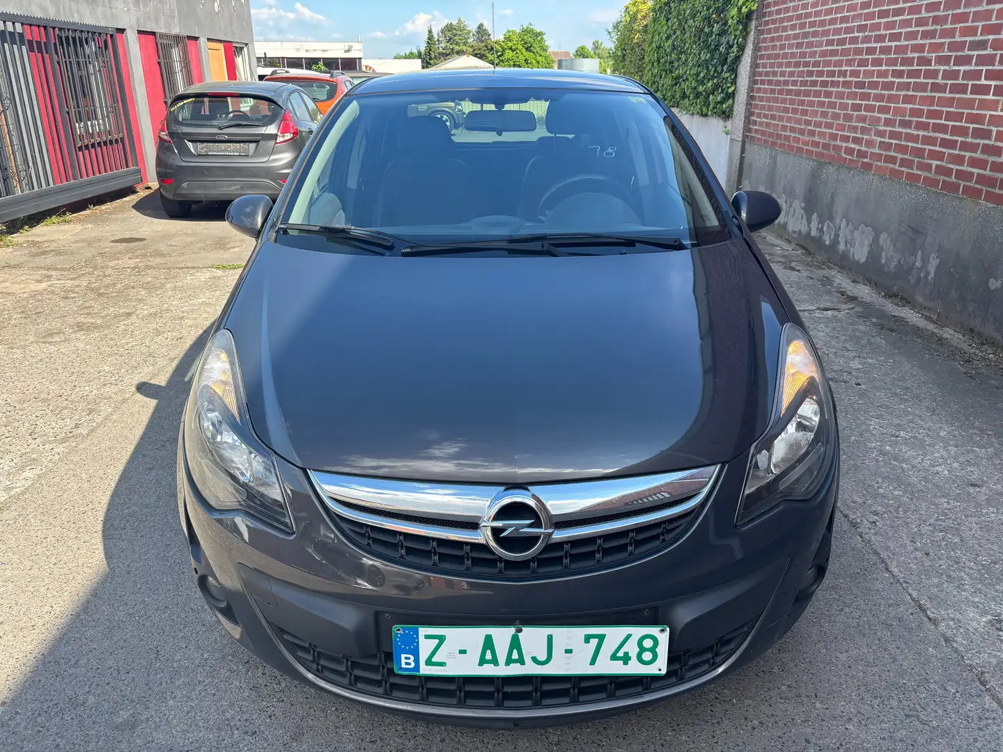Opel Corsa 1.2i Gris - 1