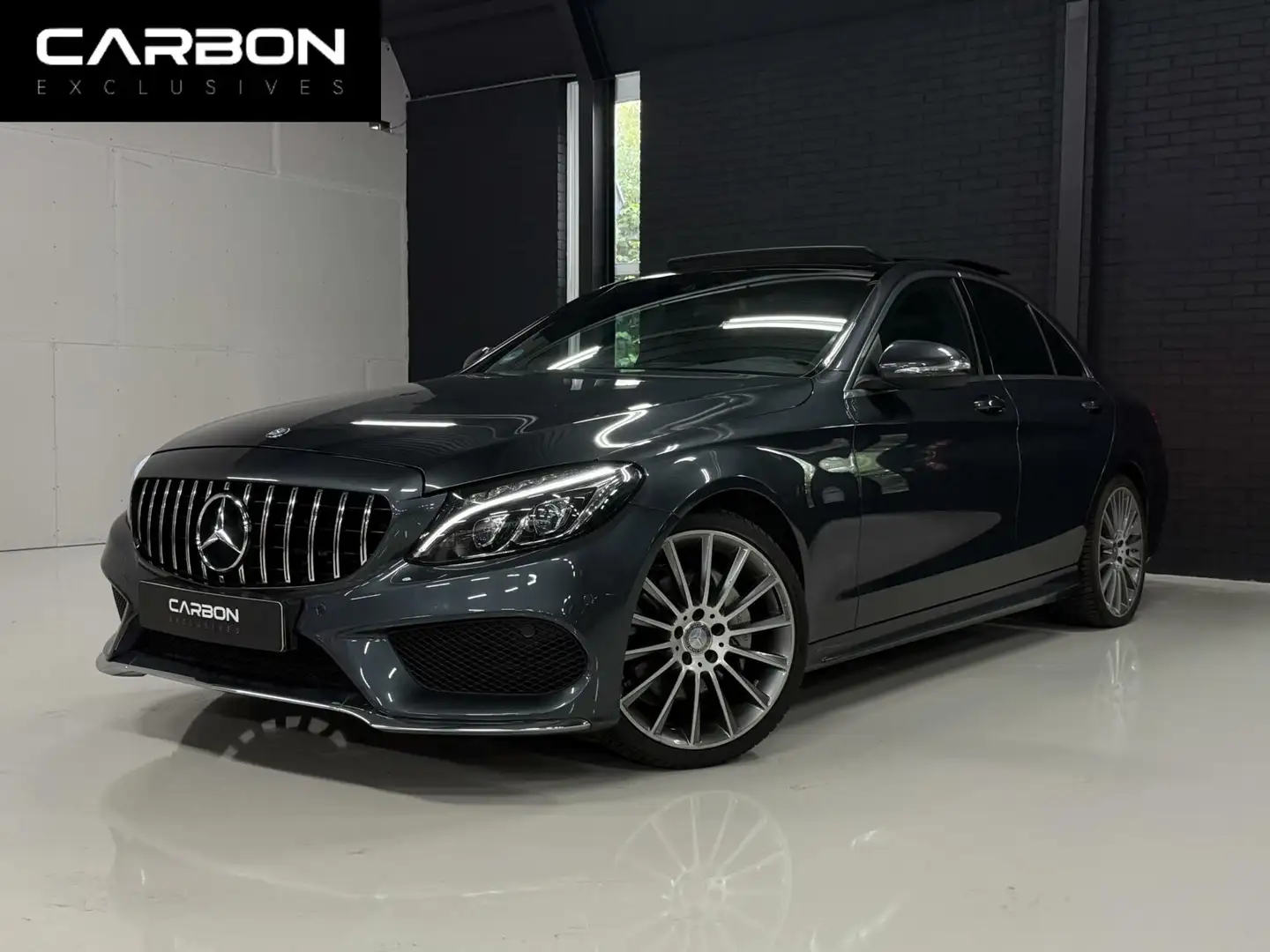 Mercedes-Benz C 180 AMG | Pano | Leder | NL | Navi | CC Grijs - 1