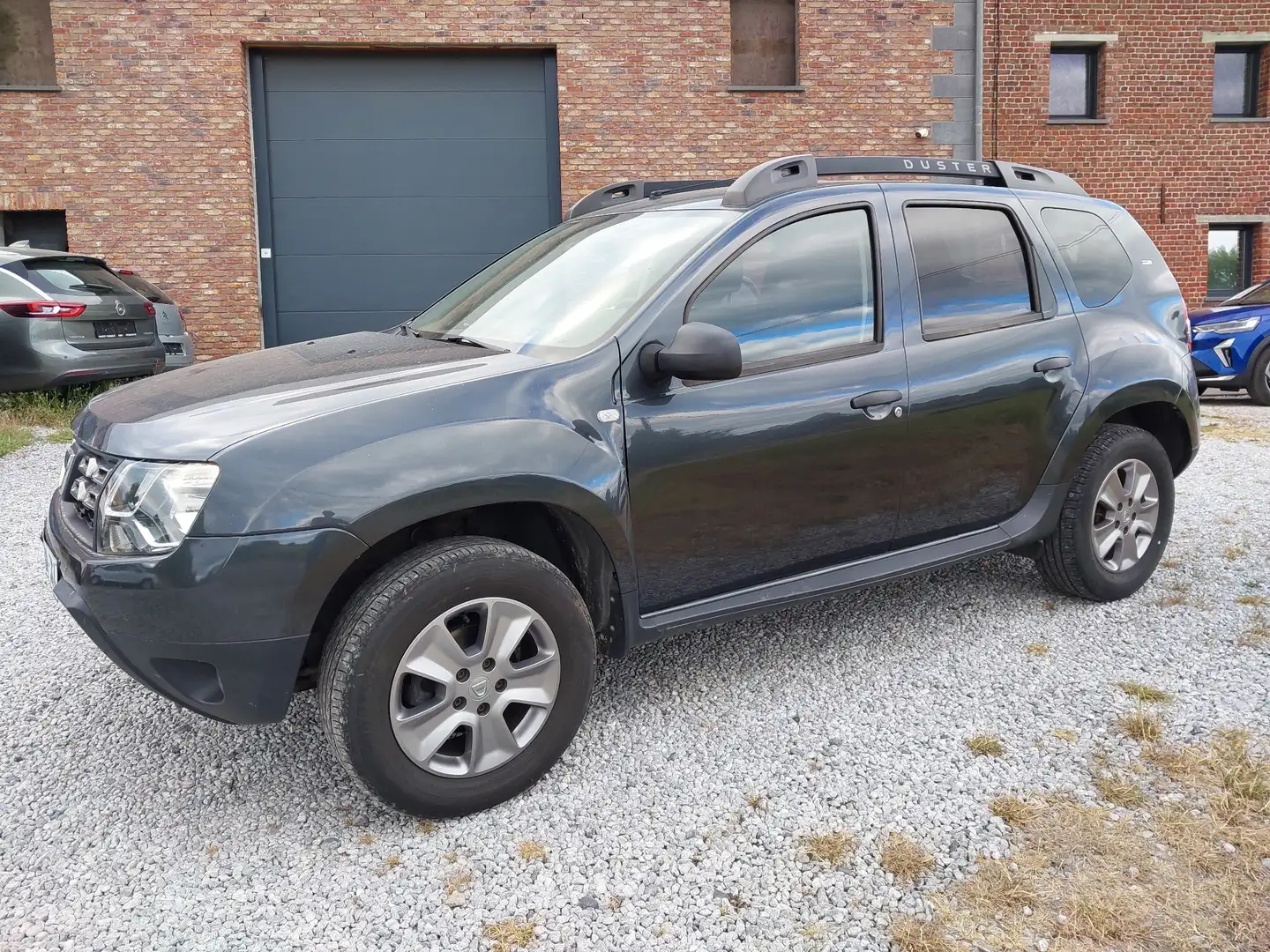 Dacia Duster 1.6i 4x2/ prête à immatriculer Gris - 1