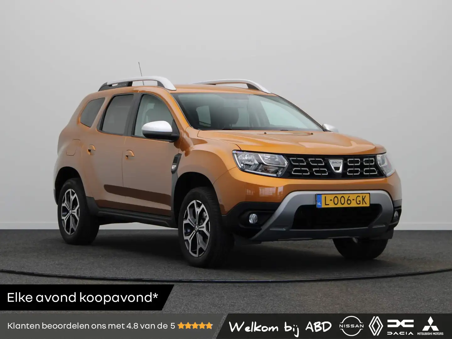 Dacia Duster 100pk TCe Bi-Fuel Prestige | LPG-G3 | Trekhaak | V Orange - 1