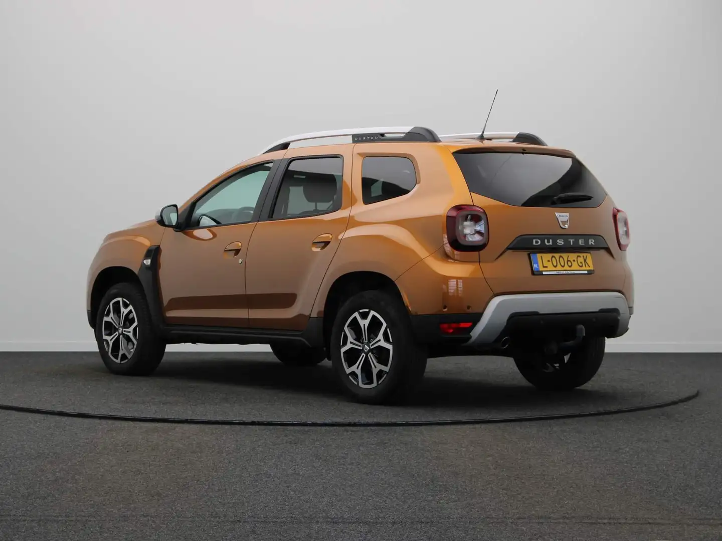 Dacia Duster 100pk TCe Bi-Fuel Prestige | LPG-G3 | Trekhaak | V Orange - 2
