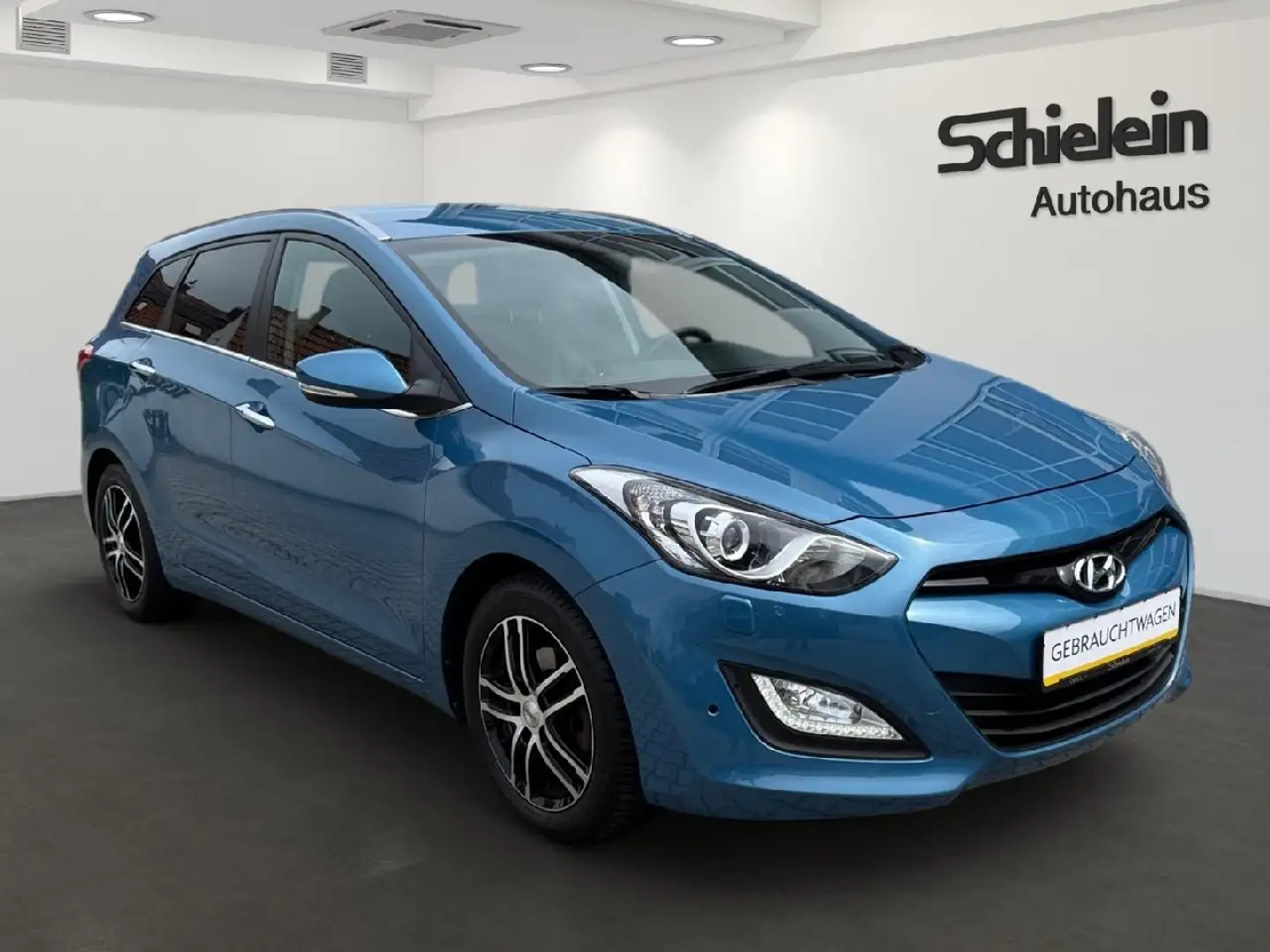 Hyundai i30 1.4 99PS Style *NAVI*XENON*R-KAMERA*SHZ* Blauw - 2