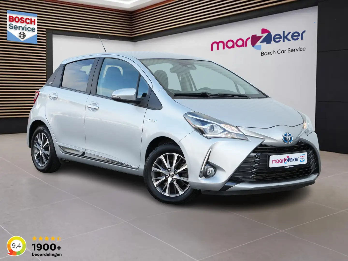 Toyota Yaris 1.5 Hybrid Y20 ✅AllSeason✅Stoelverw.✅Camera✅PhoneM Zilver - 1