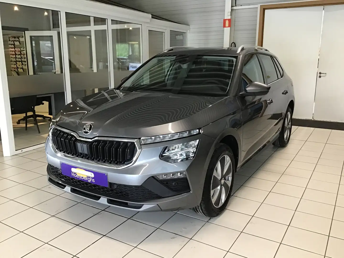Skoda Kamiq 1.0 TSI NIEUW AUTOMAAT 7KM CAMERA DABRADIO USB Grijs - 1