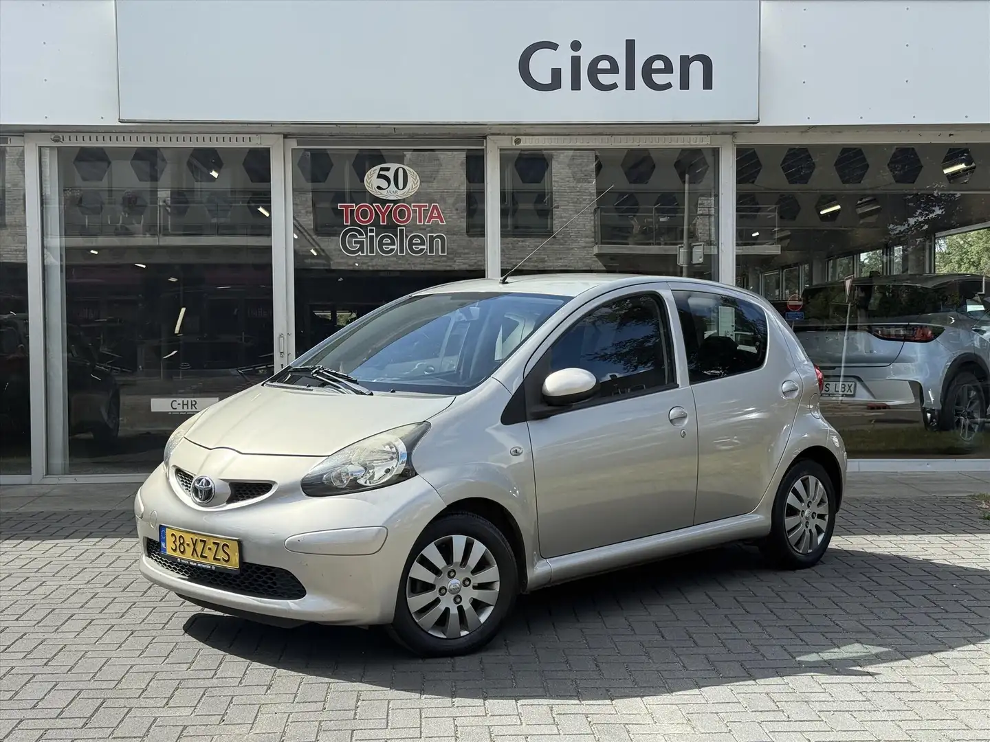 Toyota Aygo 1.0 VVT-I 5DRS Plus | Airconditioning, Lichtmetale Beige - 1