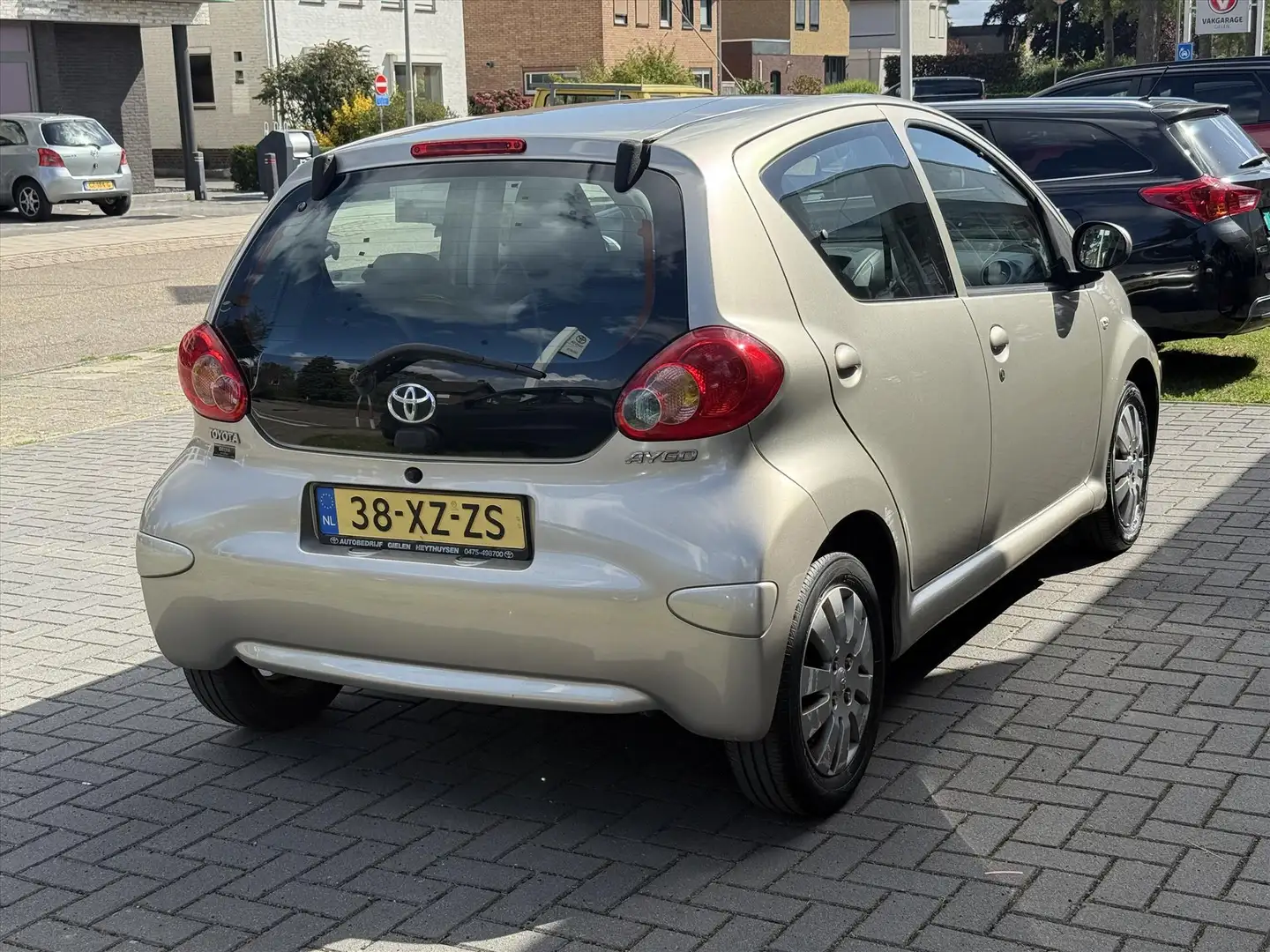 Toyota Aygo 1.0 VVT-I 5DRS Plus | Airconditioning, Lichtmetale Beige - 2